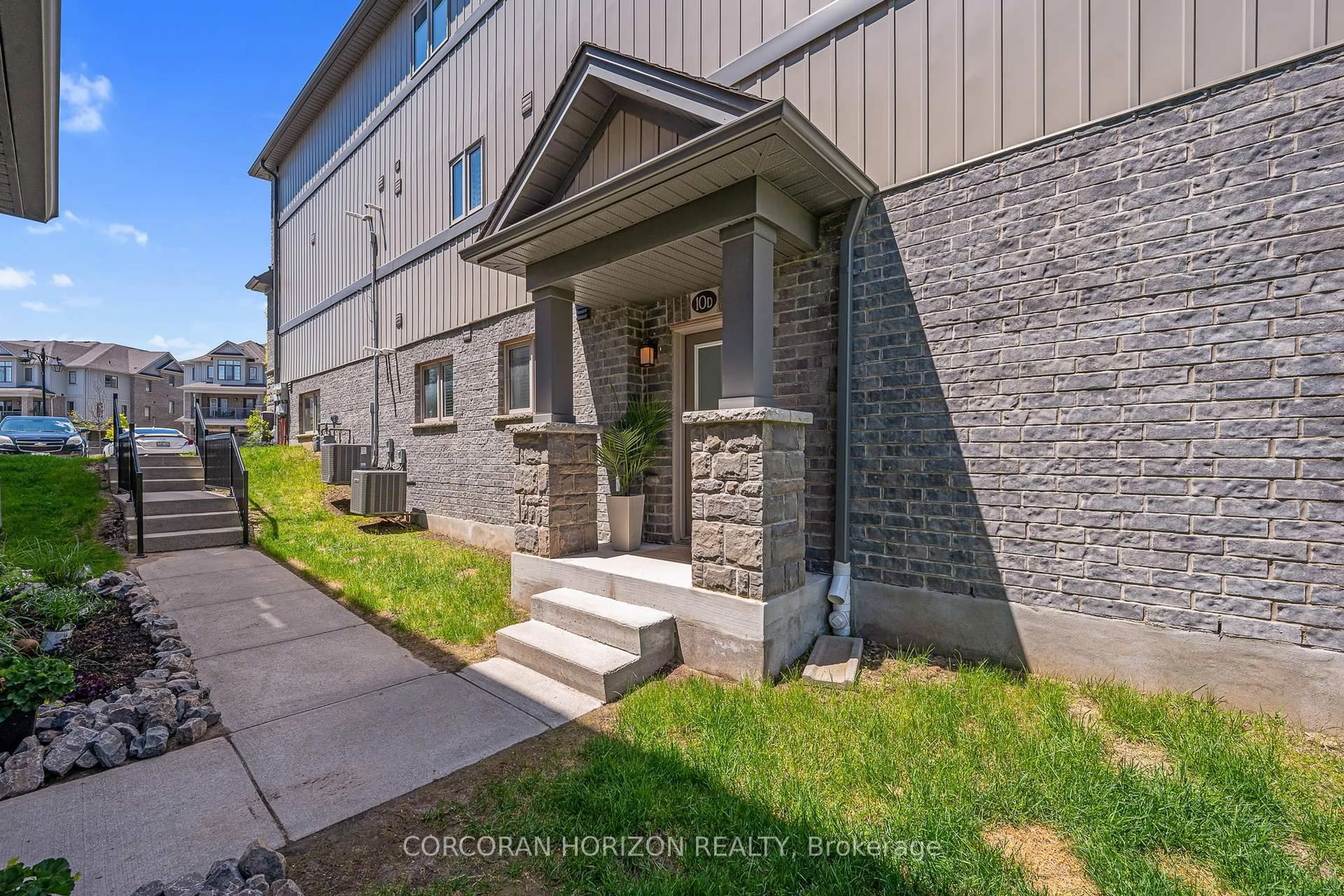 Home with brick exterior material, street for 115 South Creek Dr #10D, Kitchener Ontario N2P 0H2