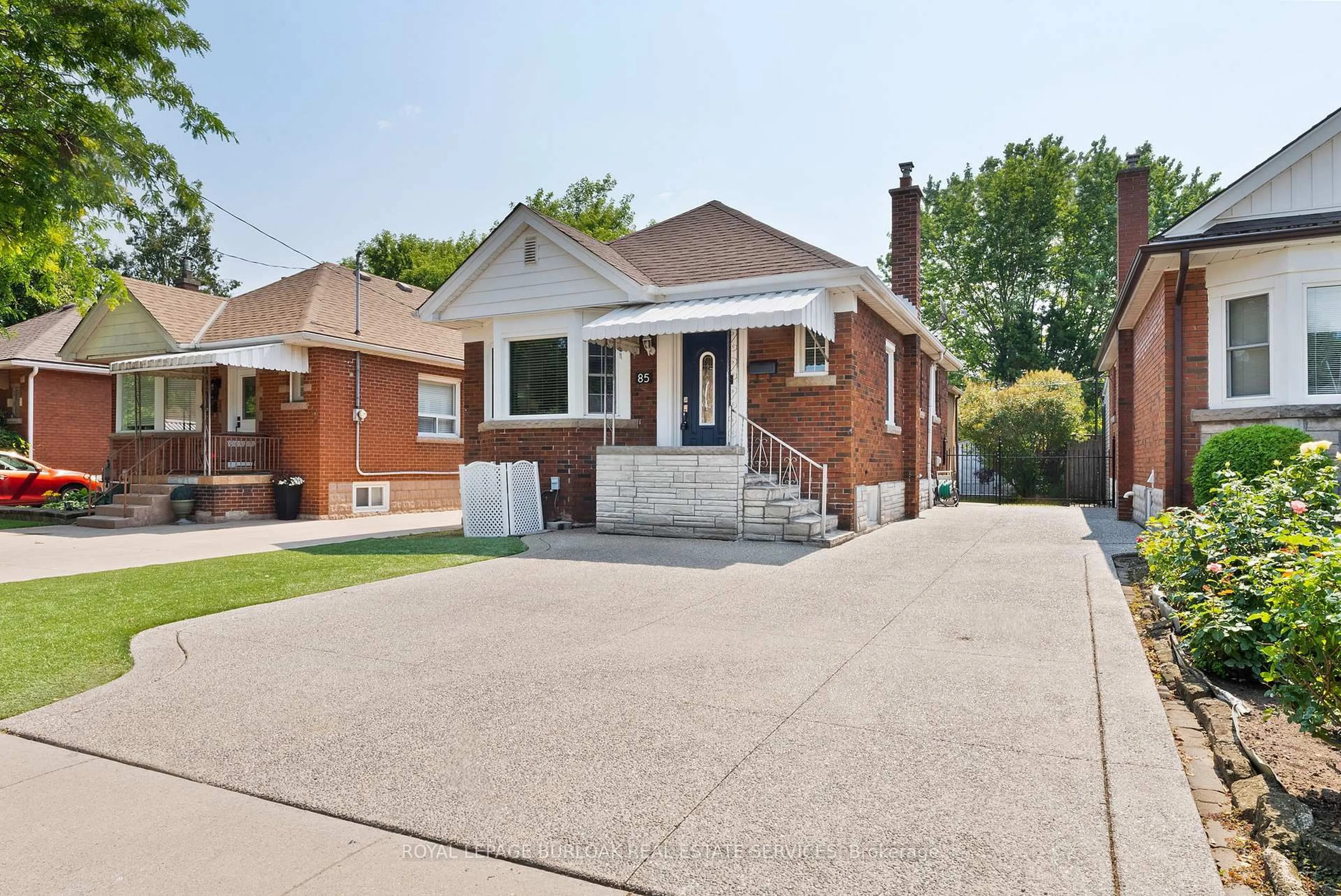 Home with brick exterior material, street for 85 Tragina Ave, Hamilton Ontario L8K 2Z4