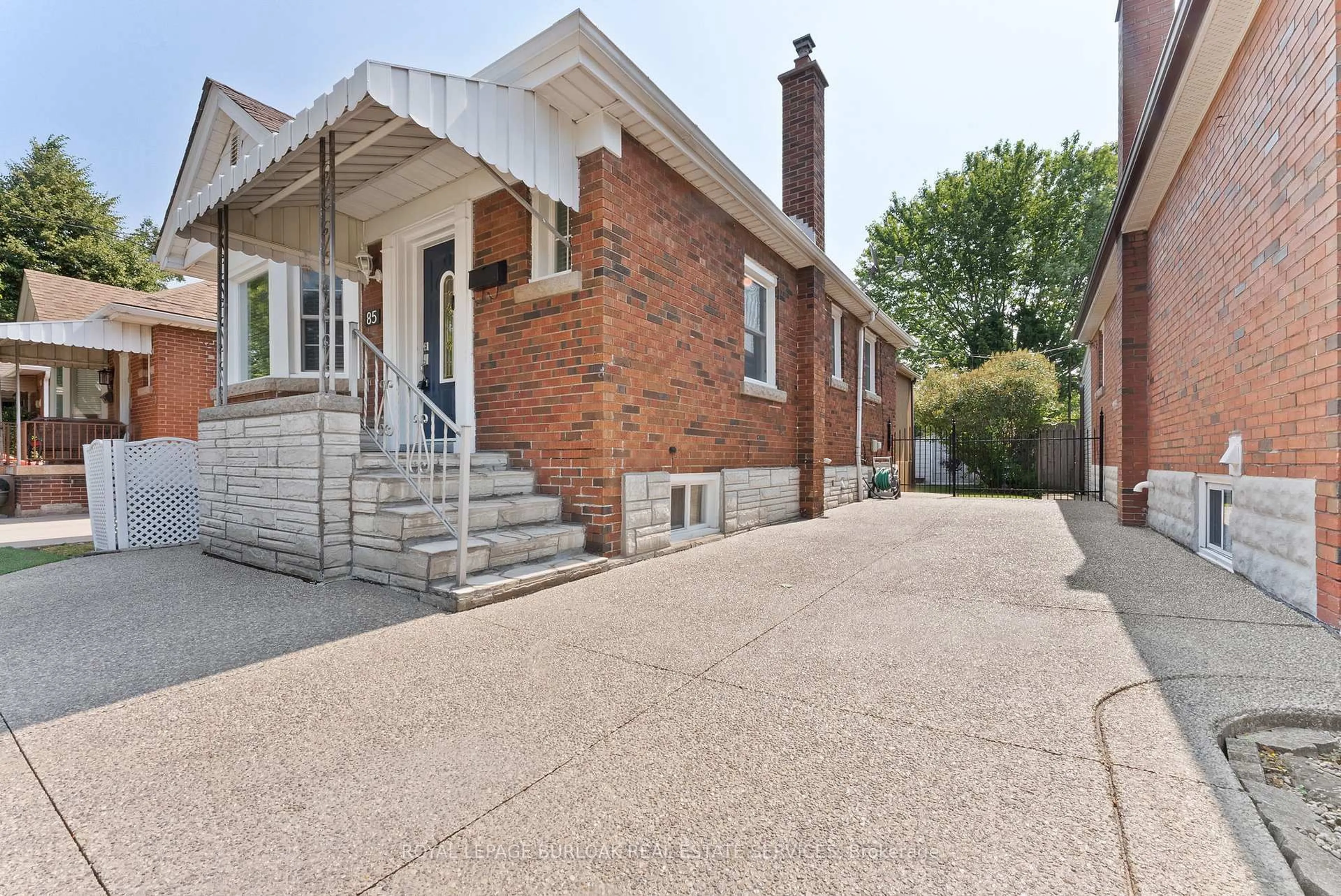 Home with brick exterior material, street for 85 Tragina Ave, Hamilton Ontario L8K 2Z4