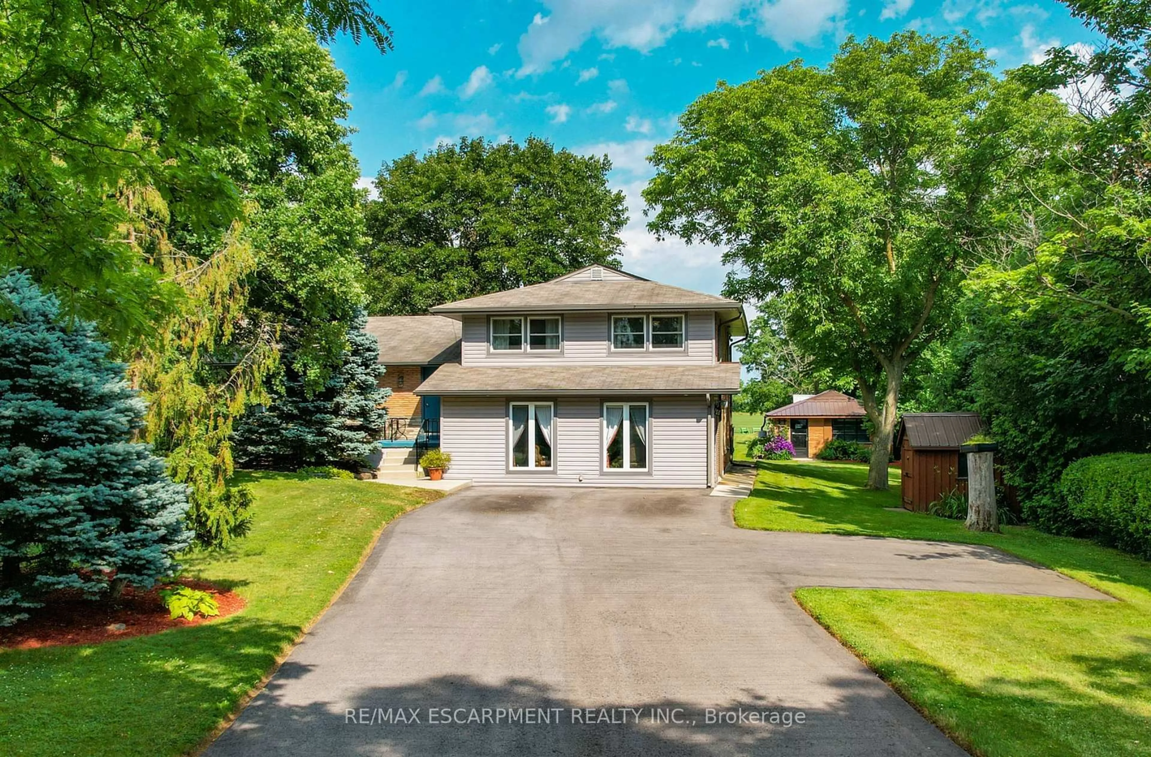 A pic from outside/outdoor area/front of a property/back of a property/a pic from drone, street for 585 Fletcher Rd, Hamilton Ontario L0R 1P0