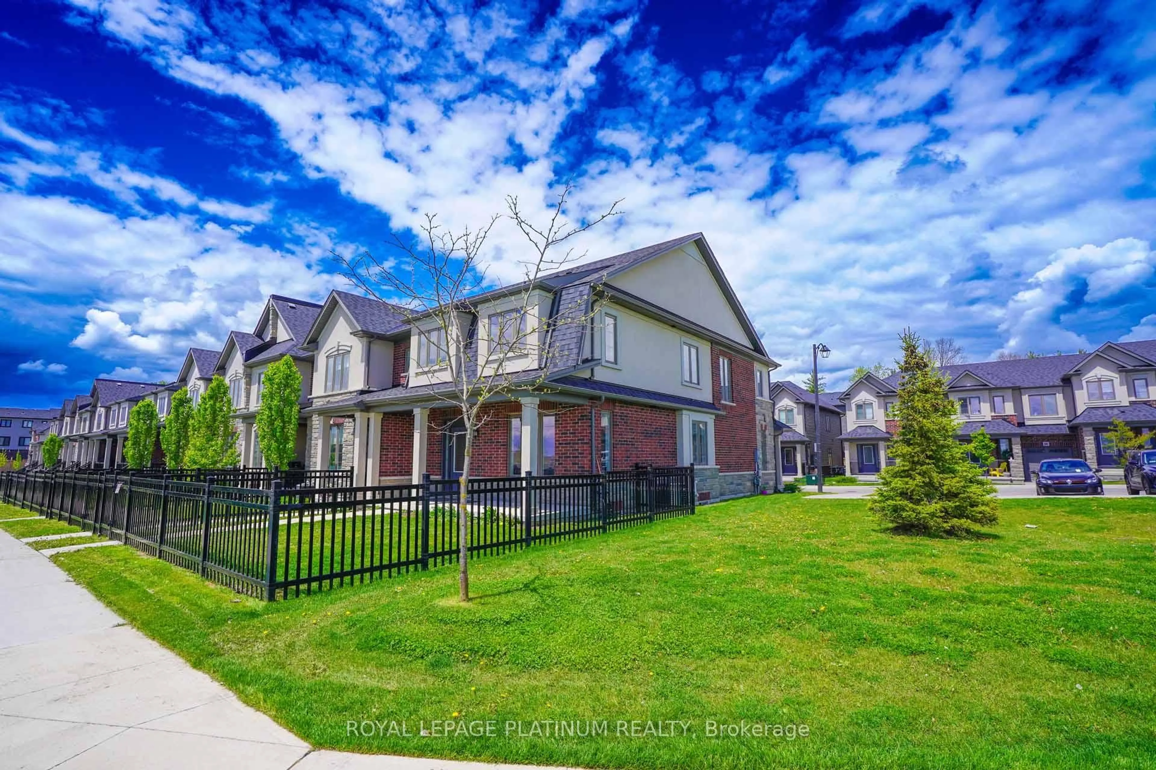 A pic from outside/outdoor area/front of a property/back of a property/a pic from drone, street for 324 Equestrian Way #71, Cambridge Ontario N3E 0E2