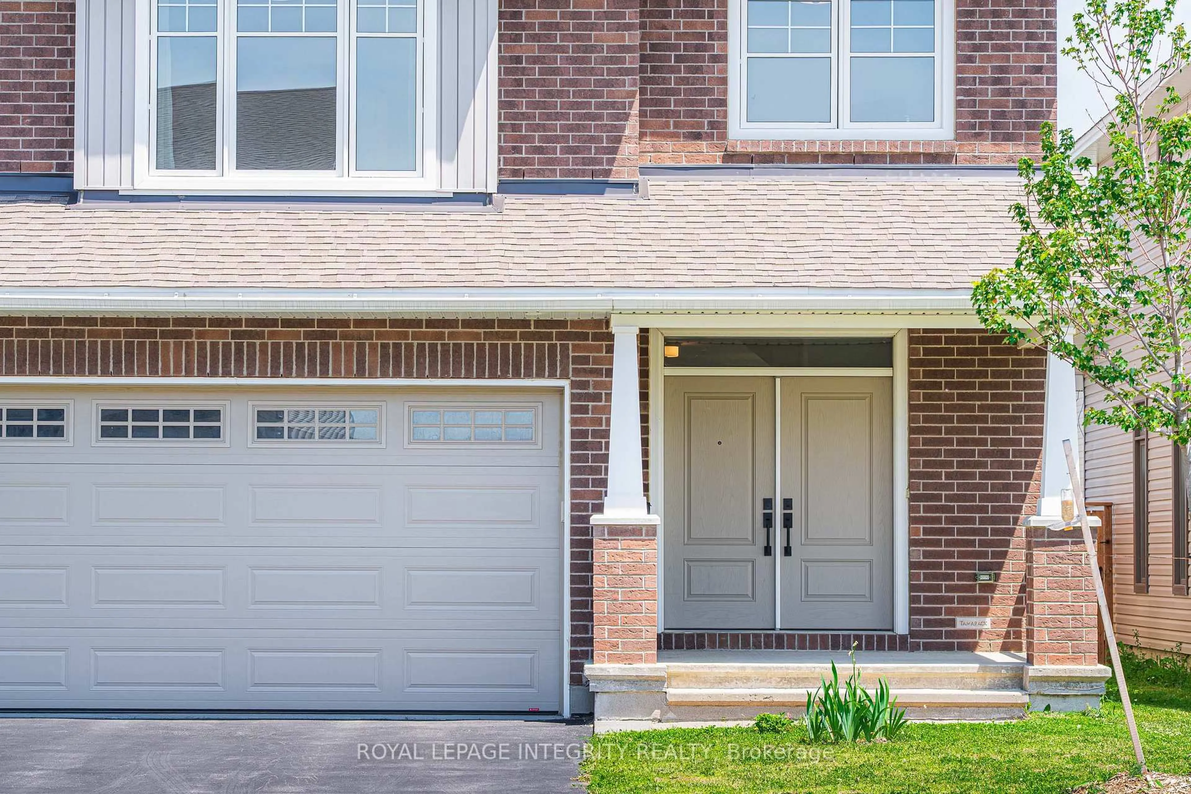 Home with brick exterior material, street for 40 Aconitum Way, Ottawa Ontario K1T 0R8