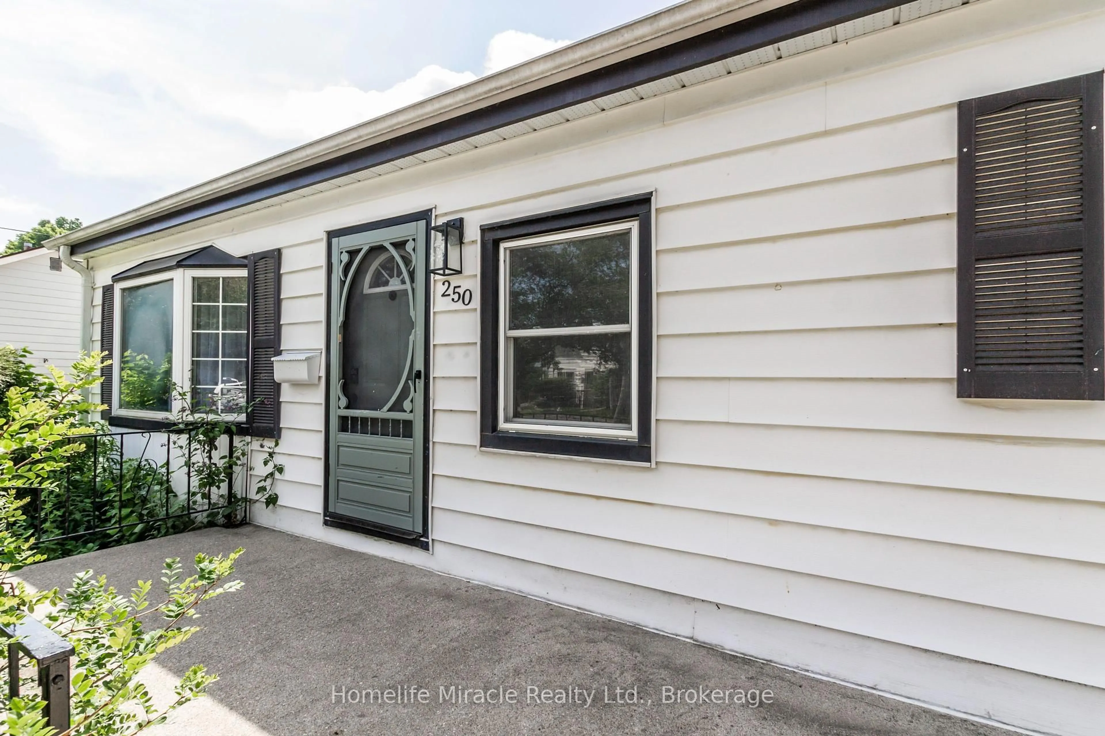 Home with vinyl exterior material, street for 250 Cardigan St, Woodstock Ontario N4S 1Z6