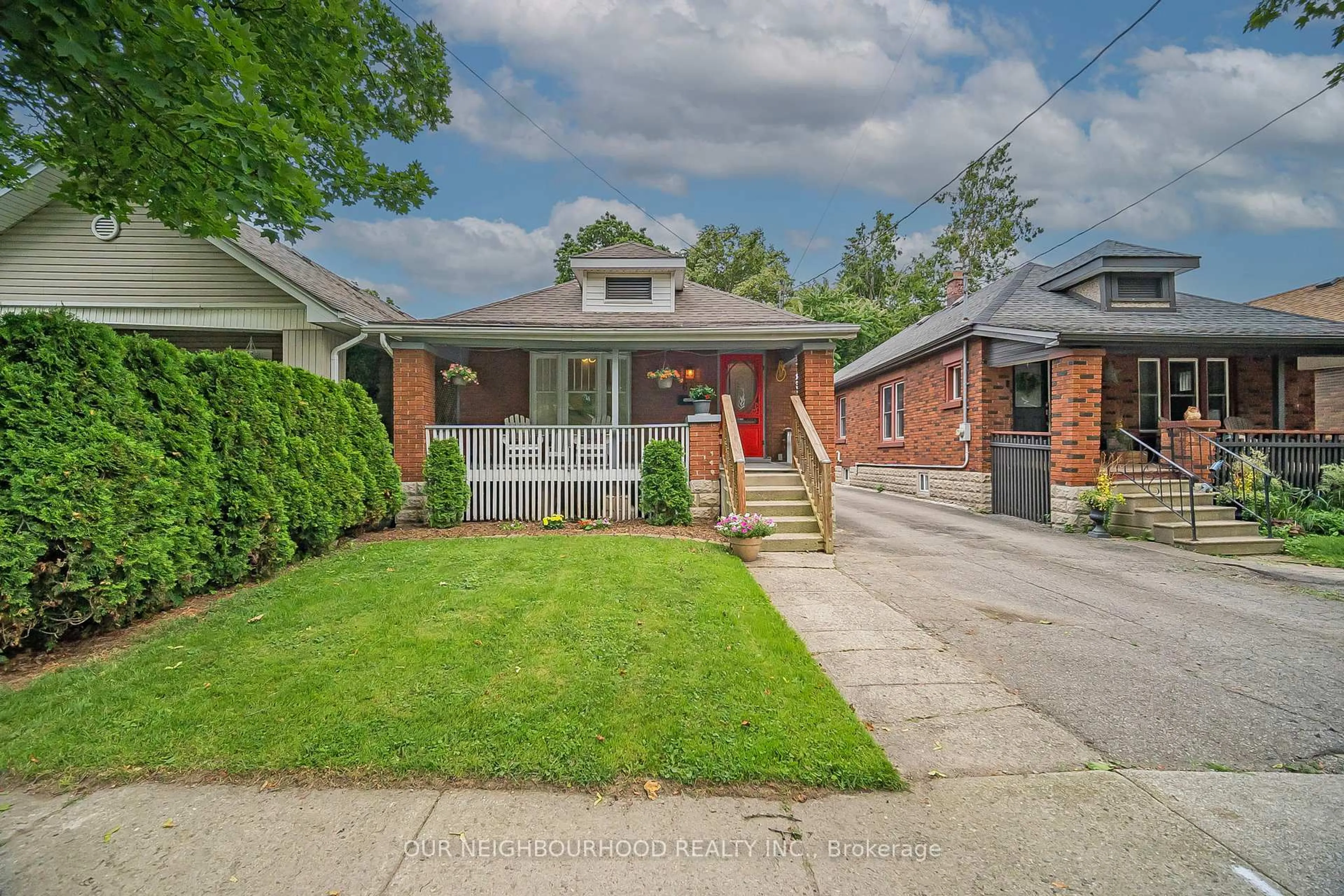 Home with brick exterior material, street for 64 Langarth St, London South Ontario N6C 1Z1
