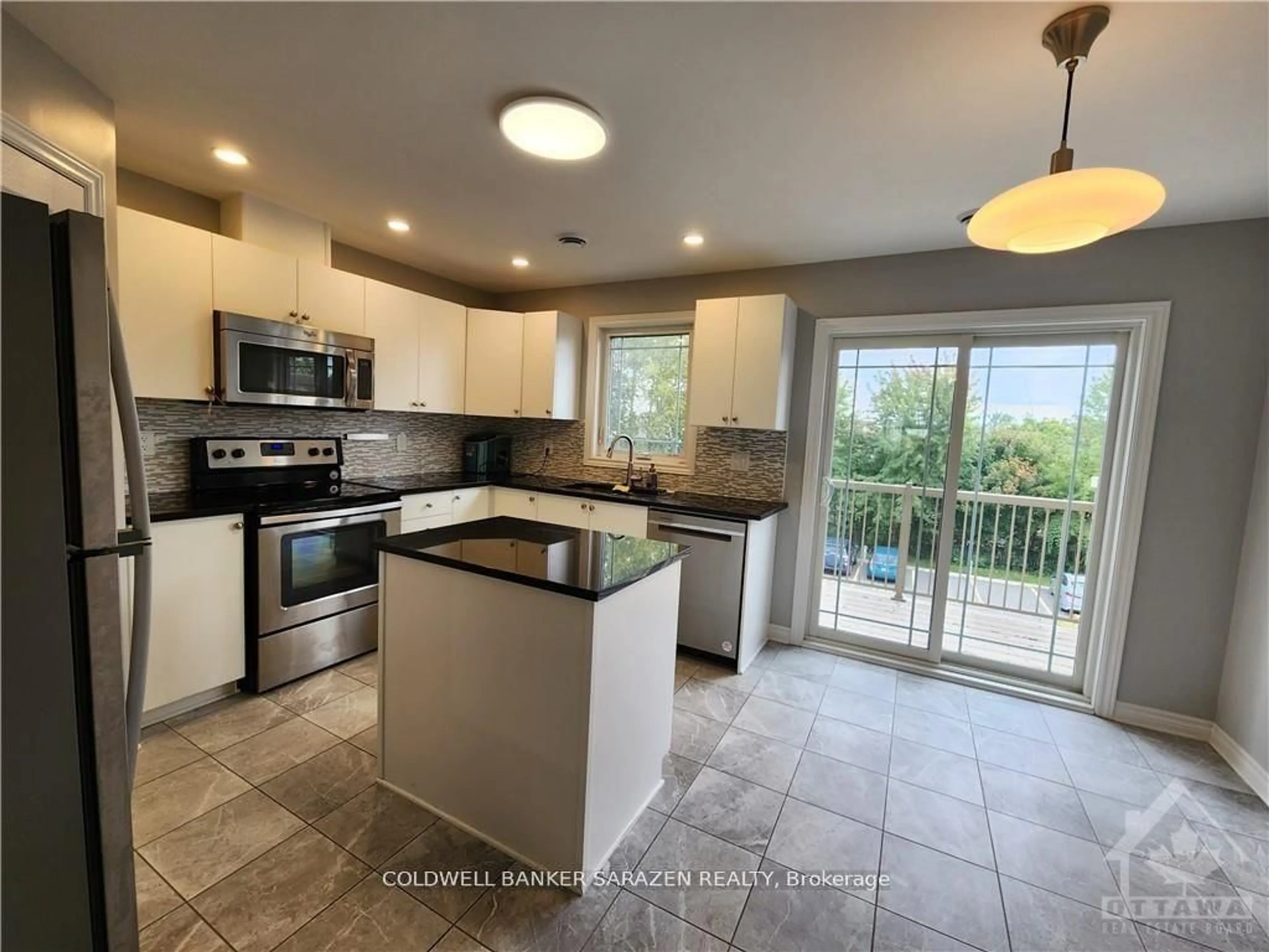 Open concept kitchen, ceramic/tile floor for 612 Danaca Private, Ottawa Ontario K1K 2V7