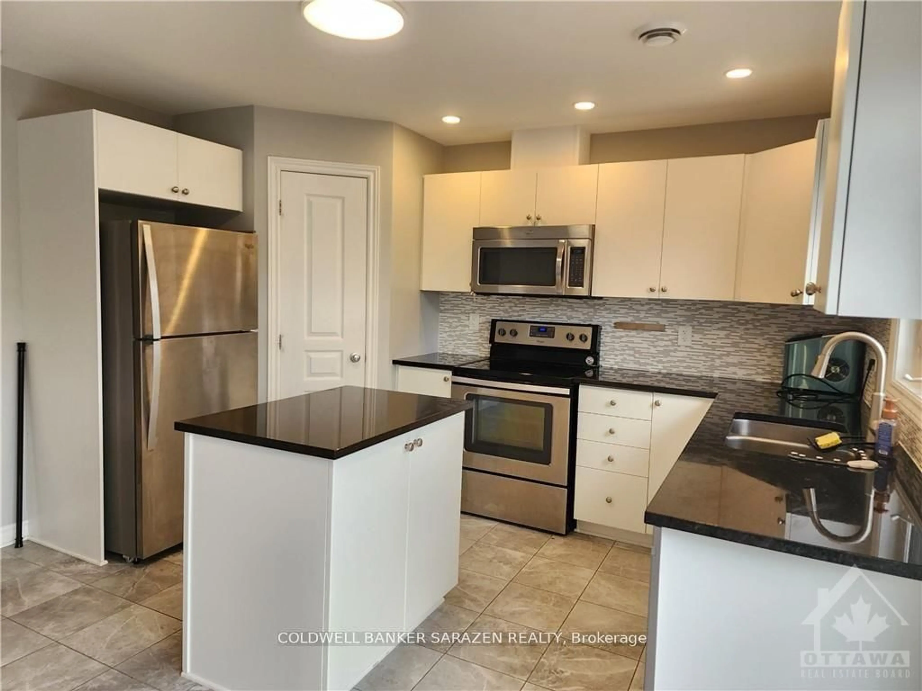 Open concept kitchen, ceramic/tile floor for 612 Danaca Private, Ottawa Ontario K1K 2V7