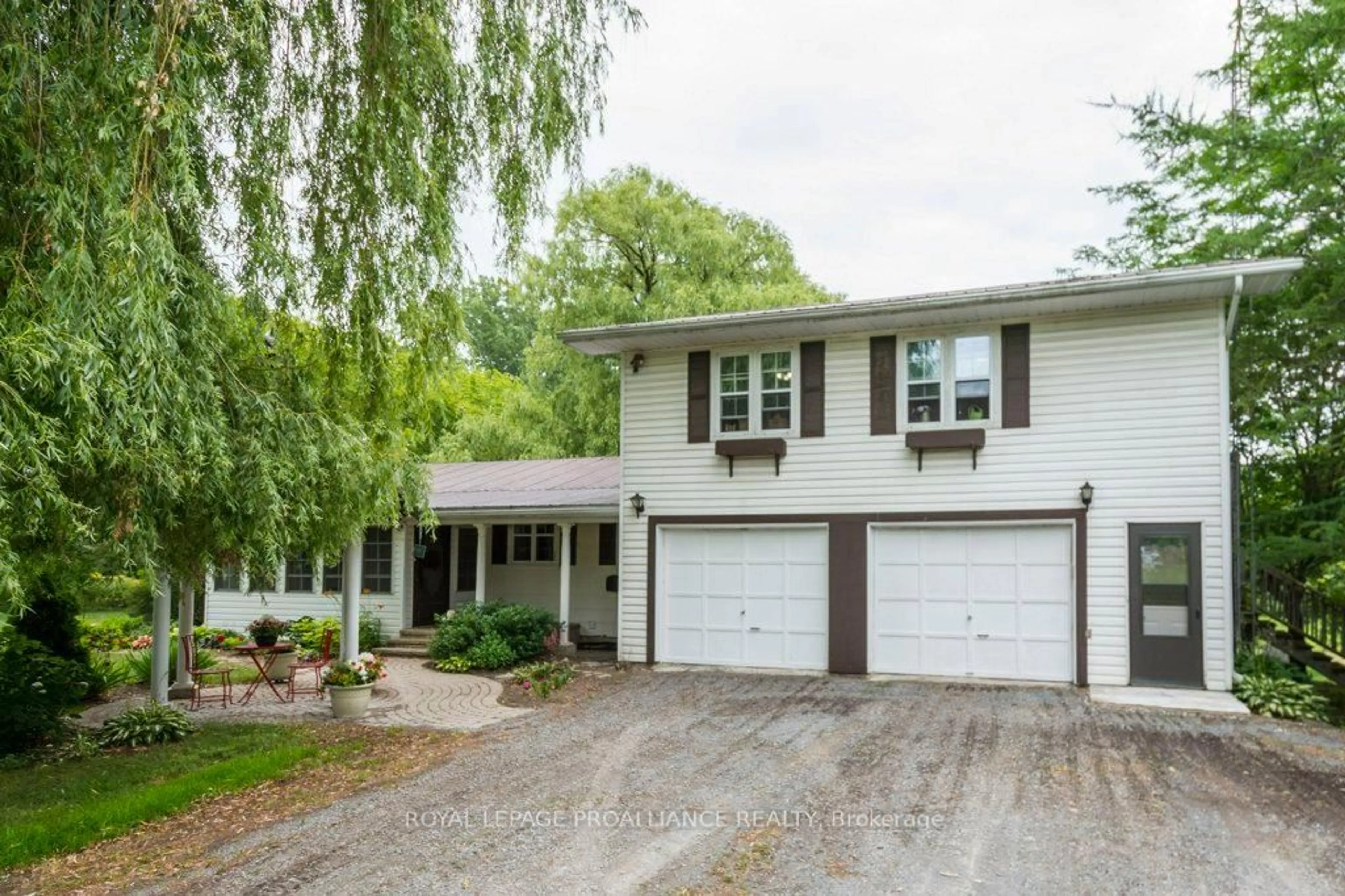 Home with vinyl exterior material, street for 21 Storms Lane, Prince Edward County Ontario K0K 2P0