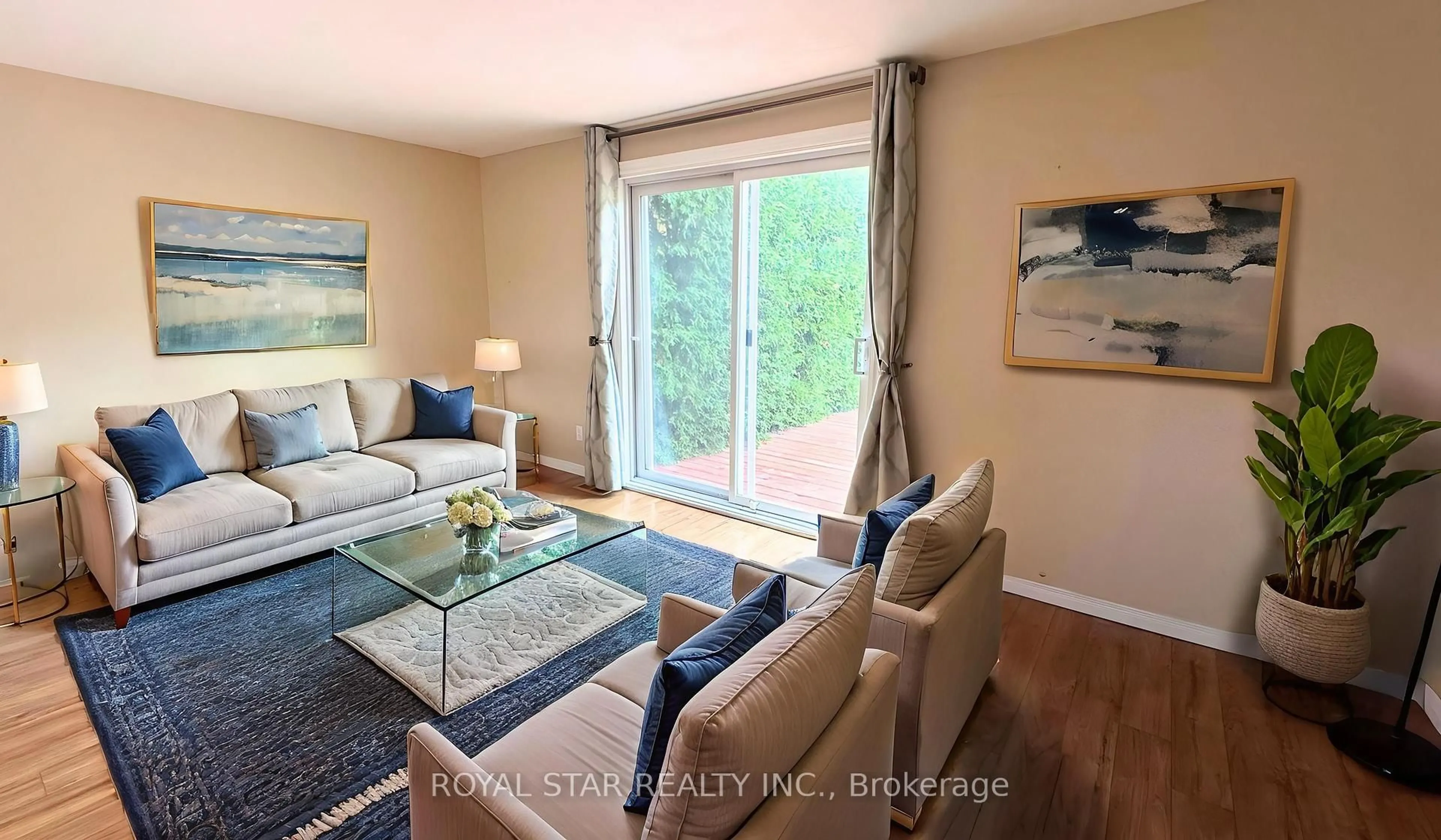 Living room with furniture, wood/laminate floor for 7 Tedwyn Dr, Barrhaven Ontario K2J 1R3