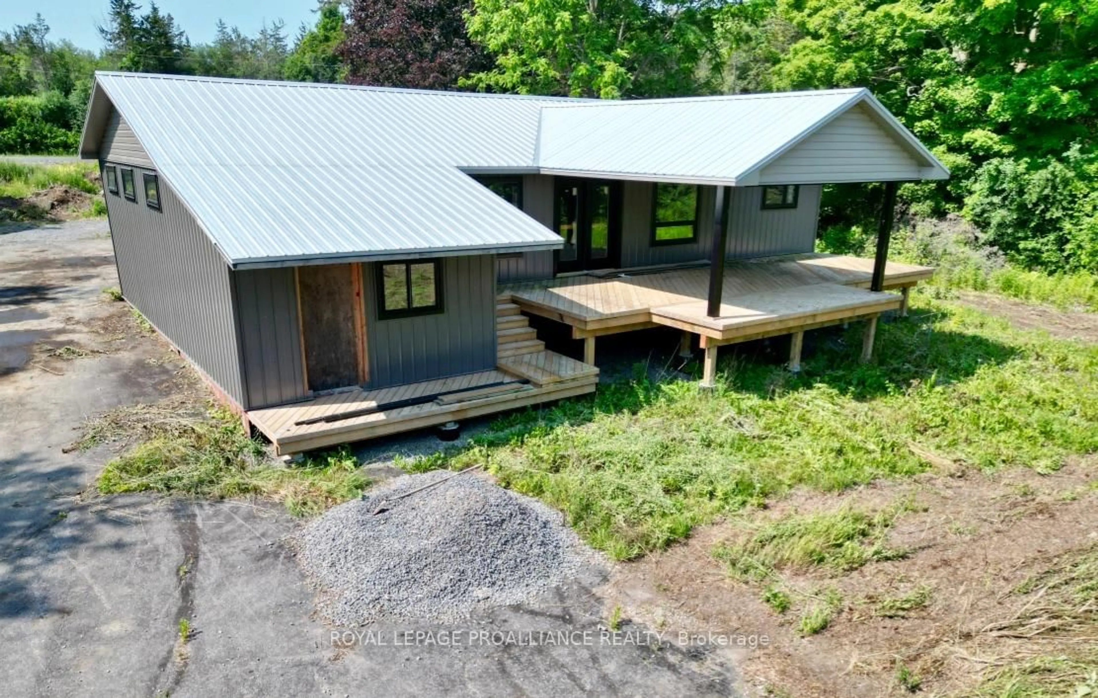 A pic from outside/outdoor area/front of a property/back of a property/a pic from drone, building for 3628 County Road 1, Prince Edward County Ontario K7G 2V6