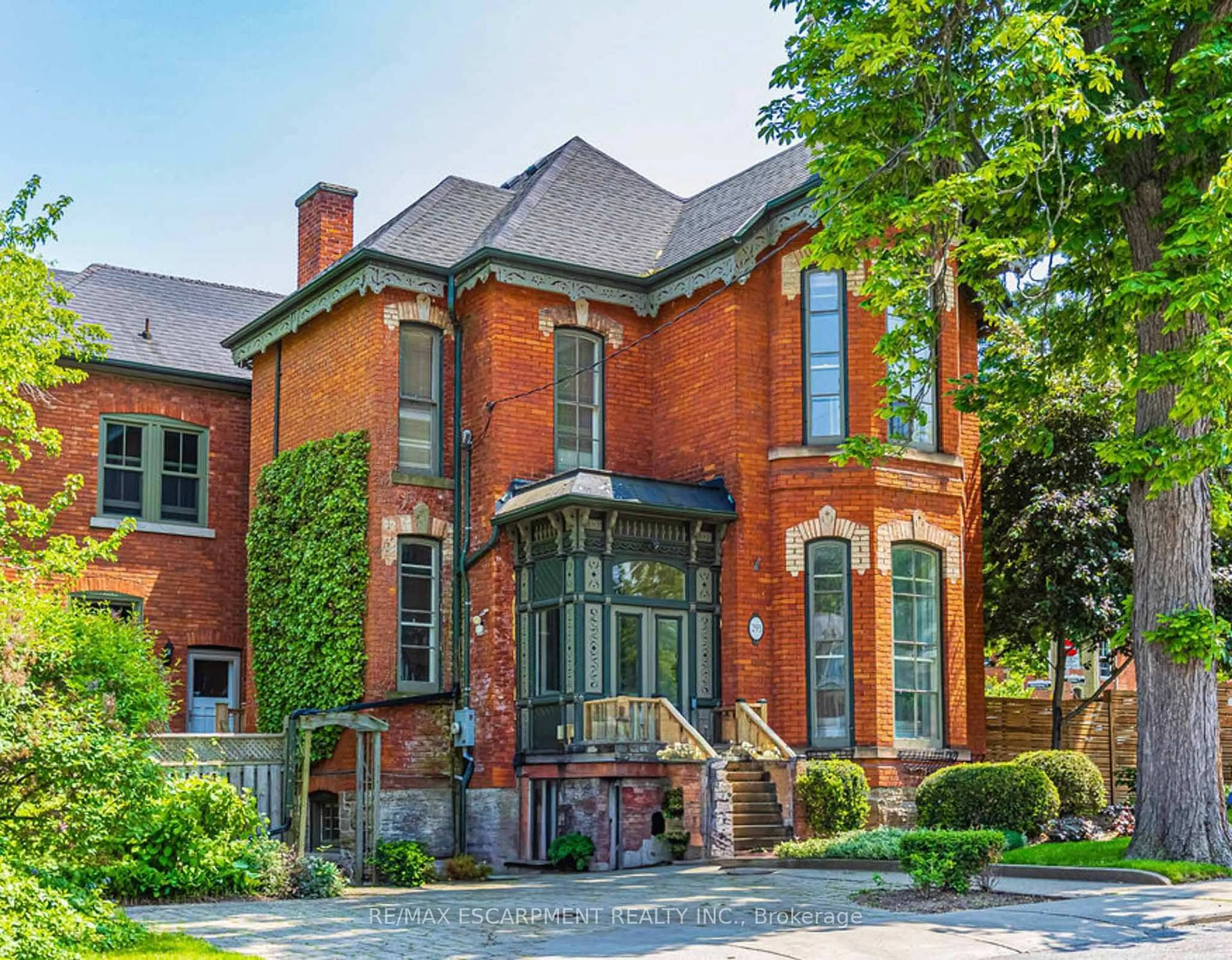 Home with brick exterior material, street for 293 Park St, Hamilton Ontario L8P 3G5