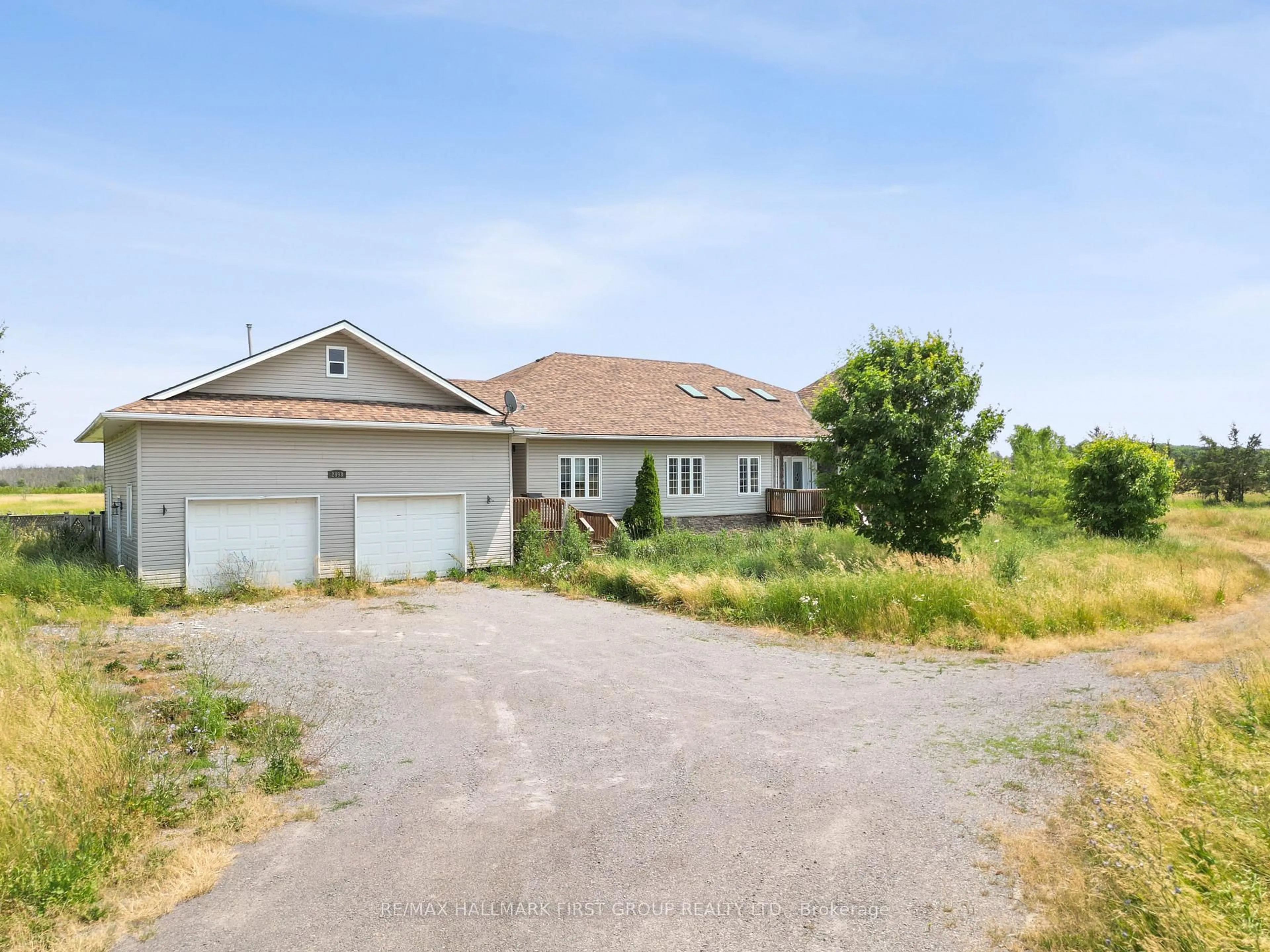 A pic from outside/outdoor area/front of a property/back of a property/a pic from drone, street for 2898 County Rd 2 Rd, Prince Edward County Ontario K0K 1A0
