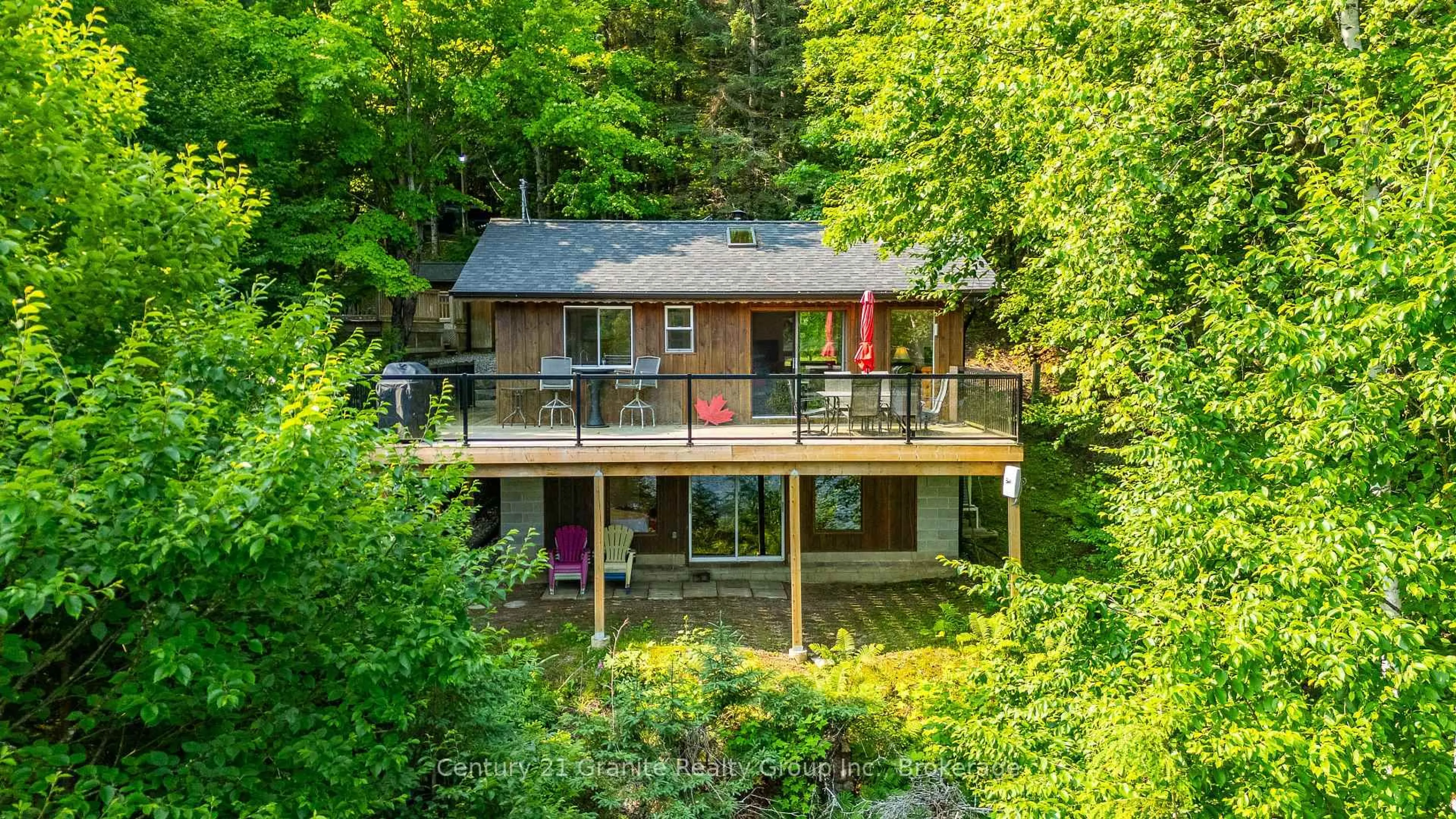 A pic from outside/outdoor area/front of a property/back of a property/a pic from drone, water/lake/river/ocean view for 1225 Rowbotham Lane, Highlands East Ontario K0L 2Y0