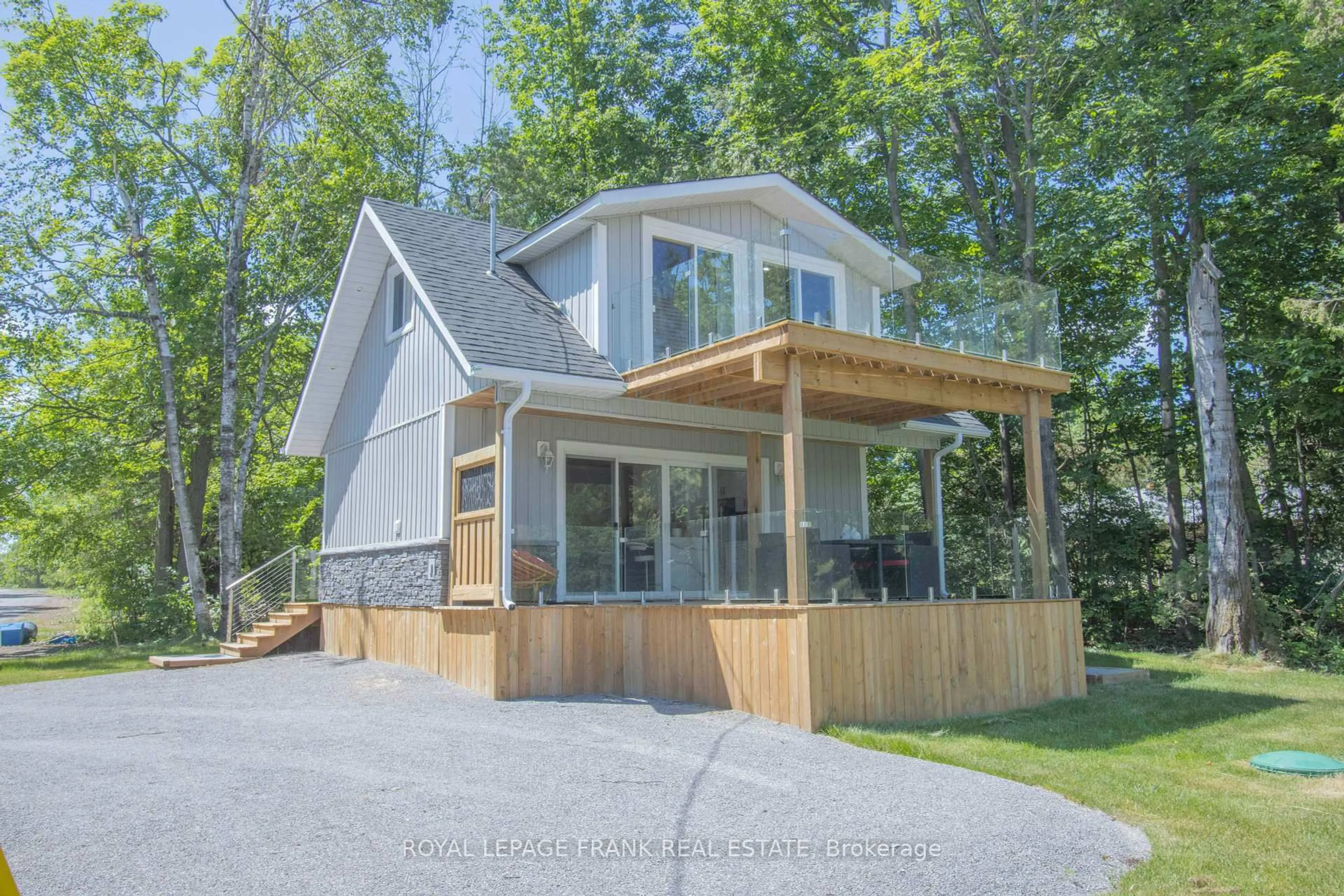 Home with vinyl exterior material, street for 71 Falls Bay Rd, Kawartha Lakes Ontario K0M 1A0