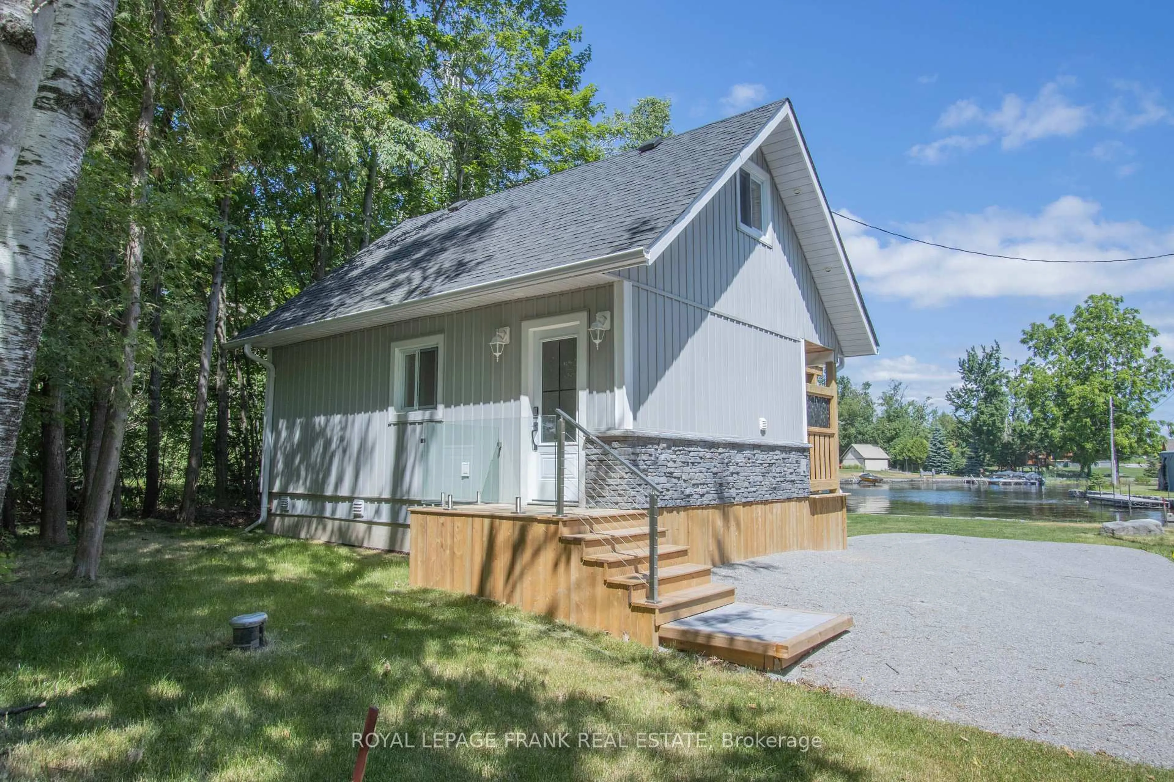 Home with vinyl exterior material, water/lake/river/ocean view for 71 Falls Bay Rd, Kawartha Lakes Ontario K0M 1A0