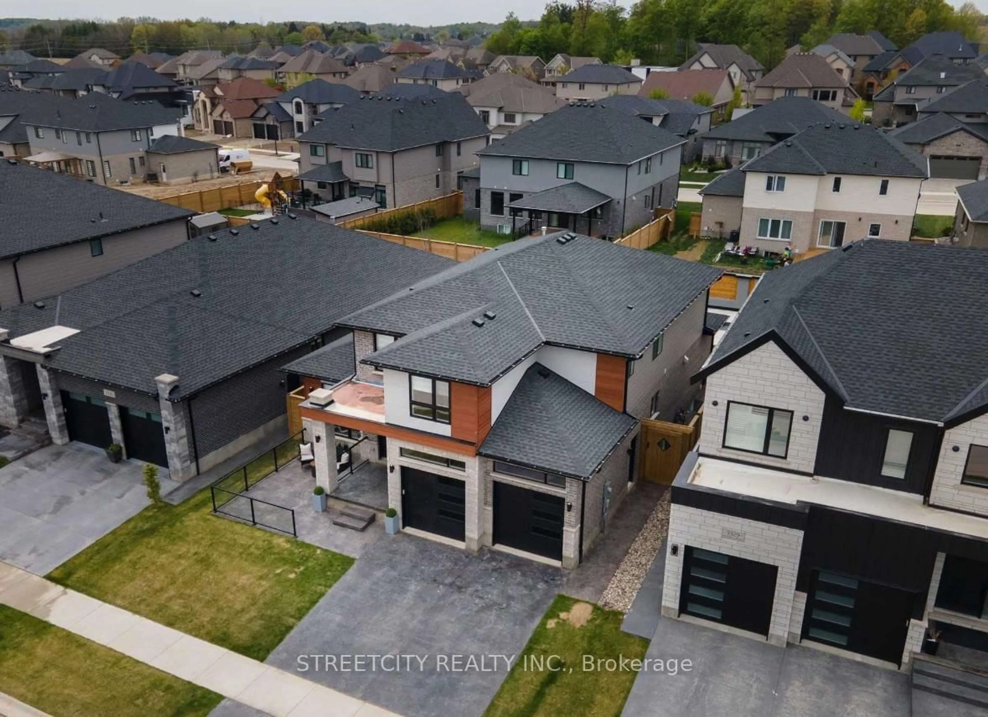 A pic from outside/outdoor area/front of a property/back of a property/a pic from drone, street for 3335 Mersea St, London South Ontario N6P 0A8