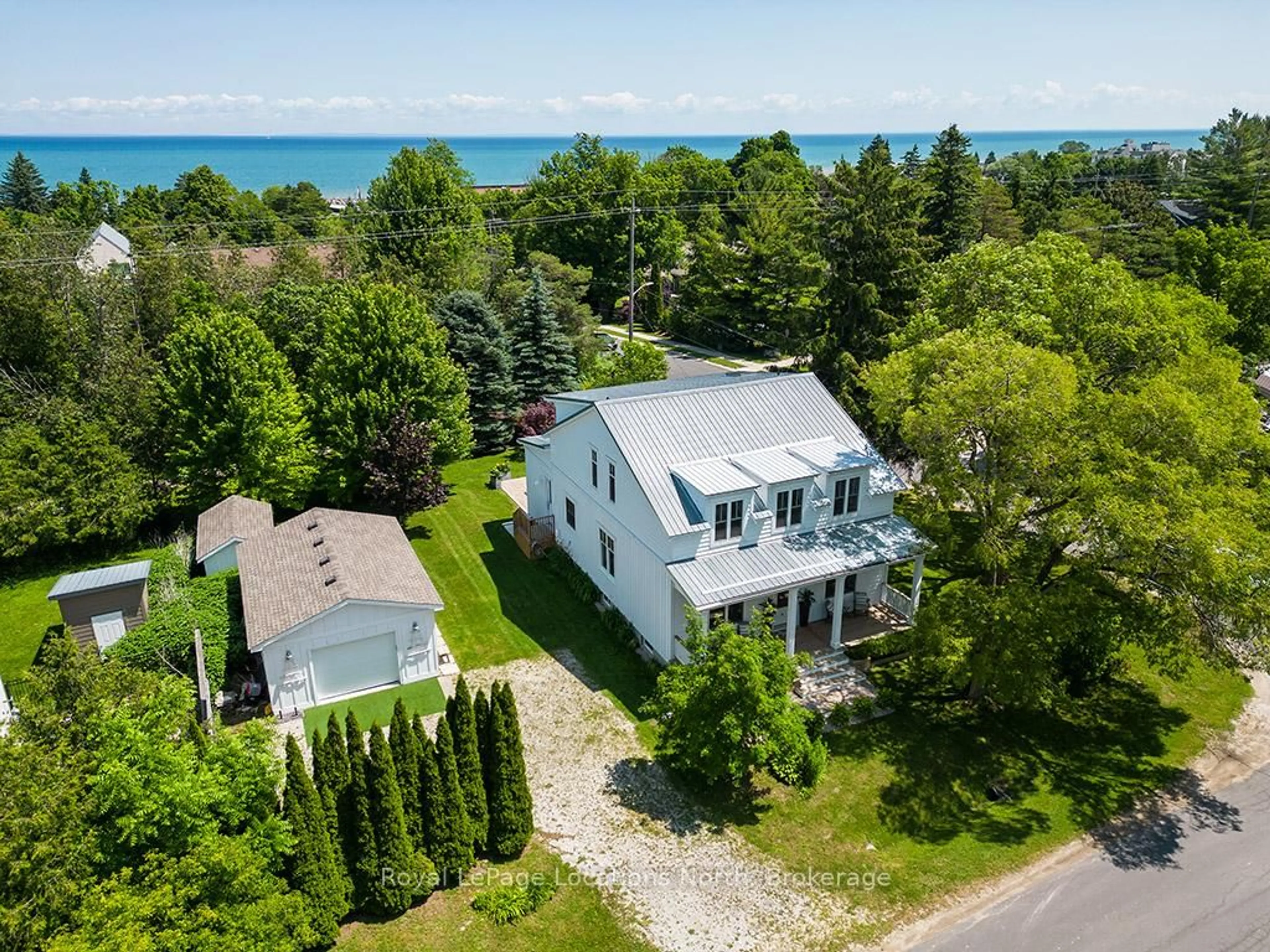 A pic from outside/outdoor area/front of a property/back of a property/a pic from drone, water/lake/river/ocean view for 46 King St, Blue Mountains Ontario N0H 2P0