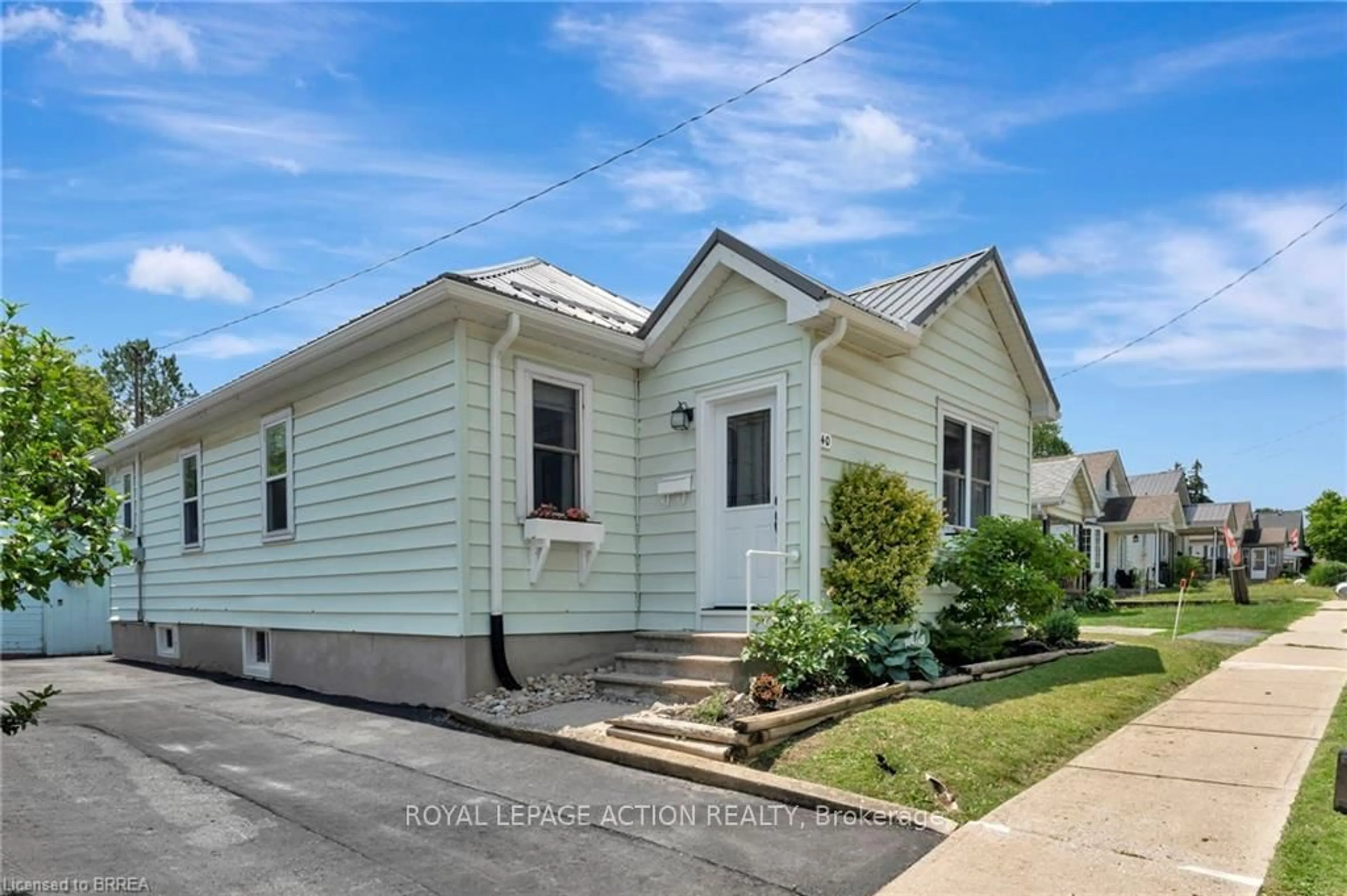 Home with vinyl exterior material, street for 240 Grove St, Norfolk Ontario N3Y 1K9