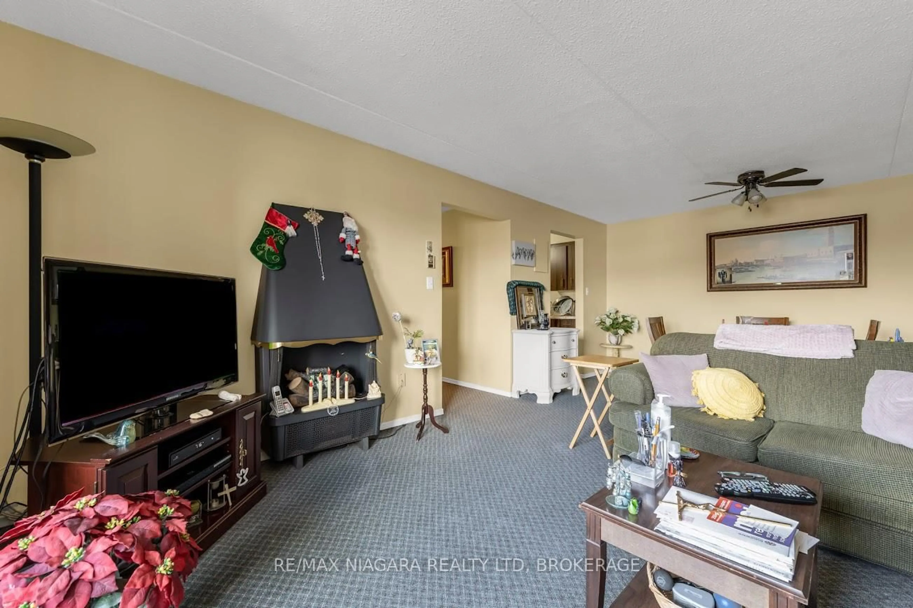 Living room with furniture, unknown for 72 Main St #212, Port Colborne Ontario L3K 5Z8