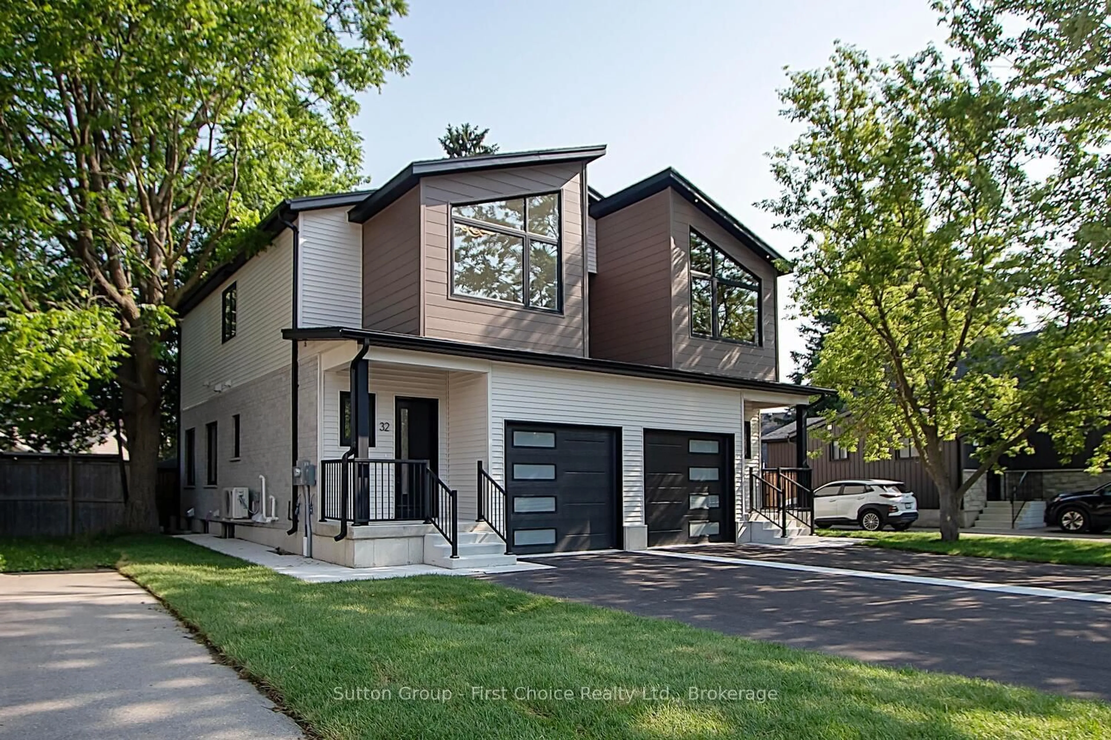 Home with brick exterior material, street for 32 Cobourg Lane, Stratford Ontario N5A 1E7
