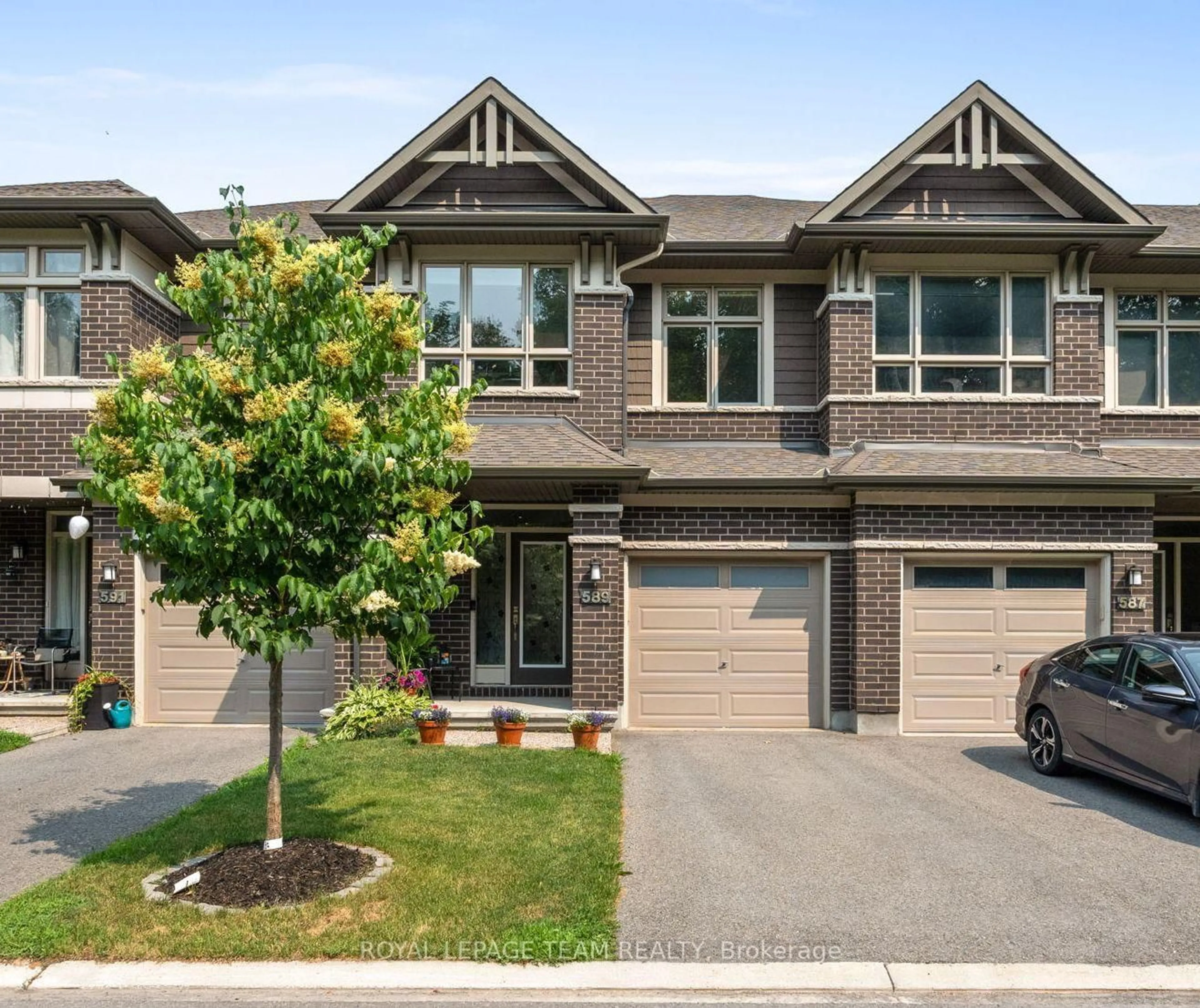 Home with brick exterior material, street for 589 Rowers Way, Ottawa Ontario K1X 0C5