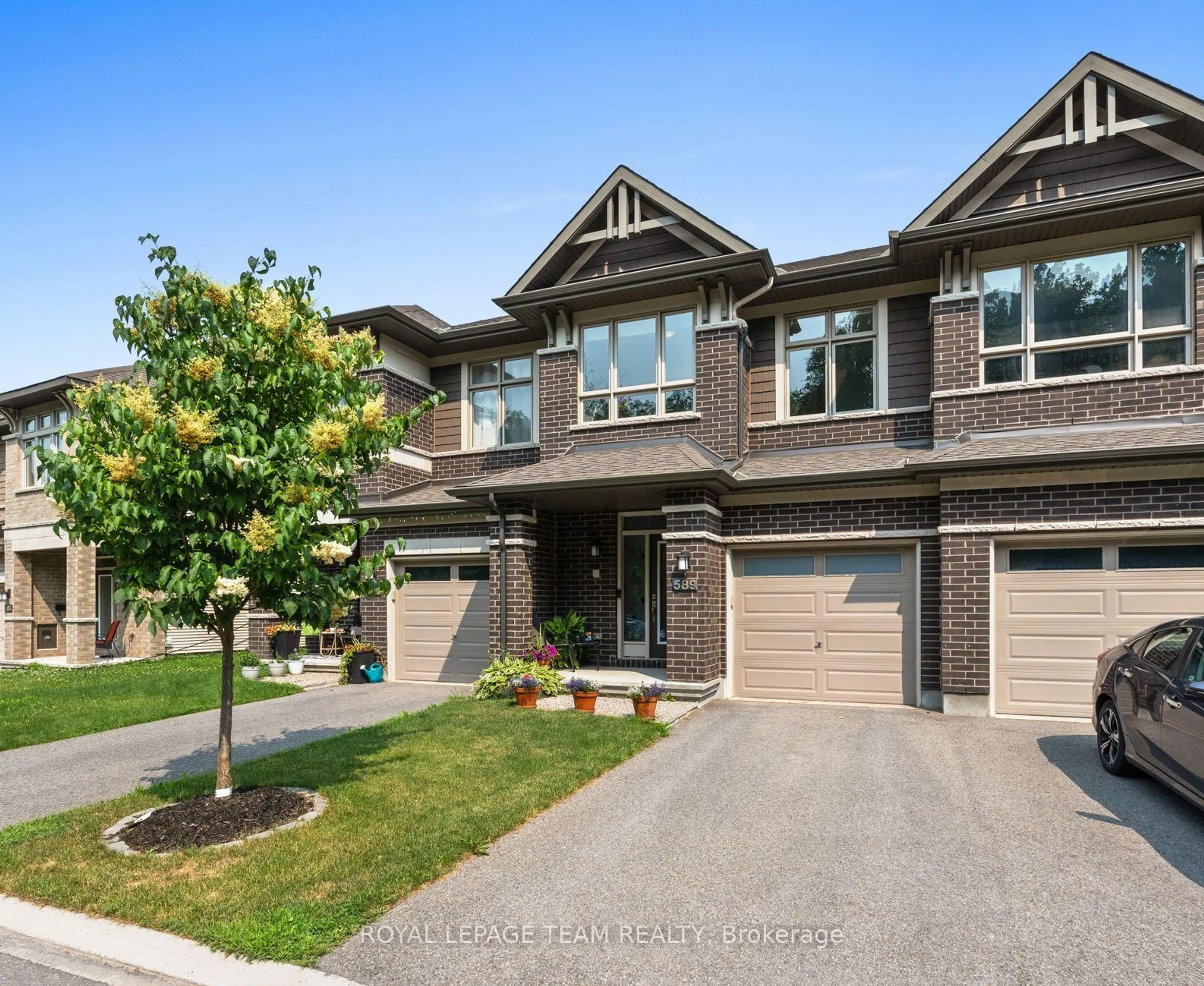Home with brick exterior material, street for 589 Rowers Way, Ottawa Ontario K1X 0C5