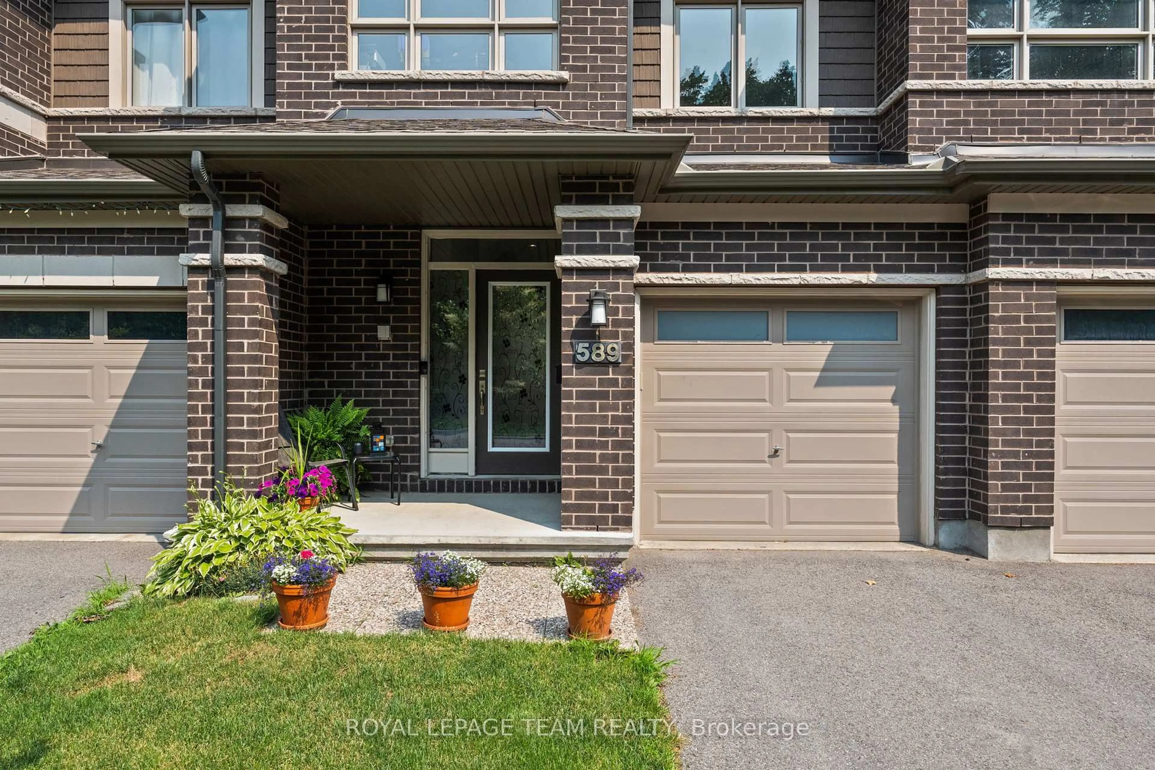 Home with brick exterior material, street for 589 Rowers Way, Ottawa Ontario K1X 0C5