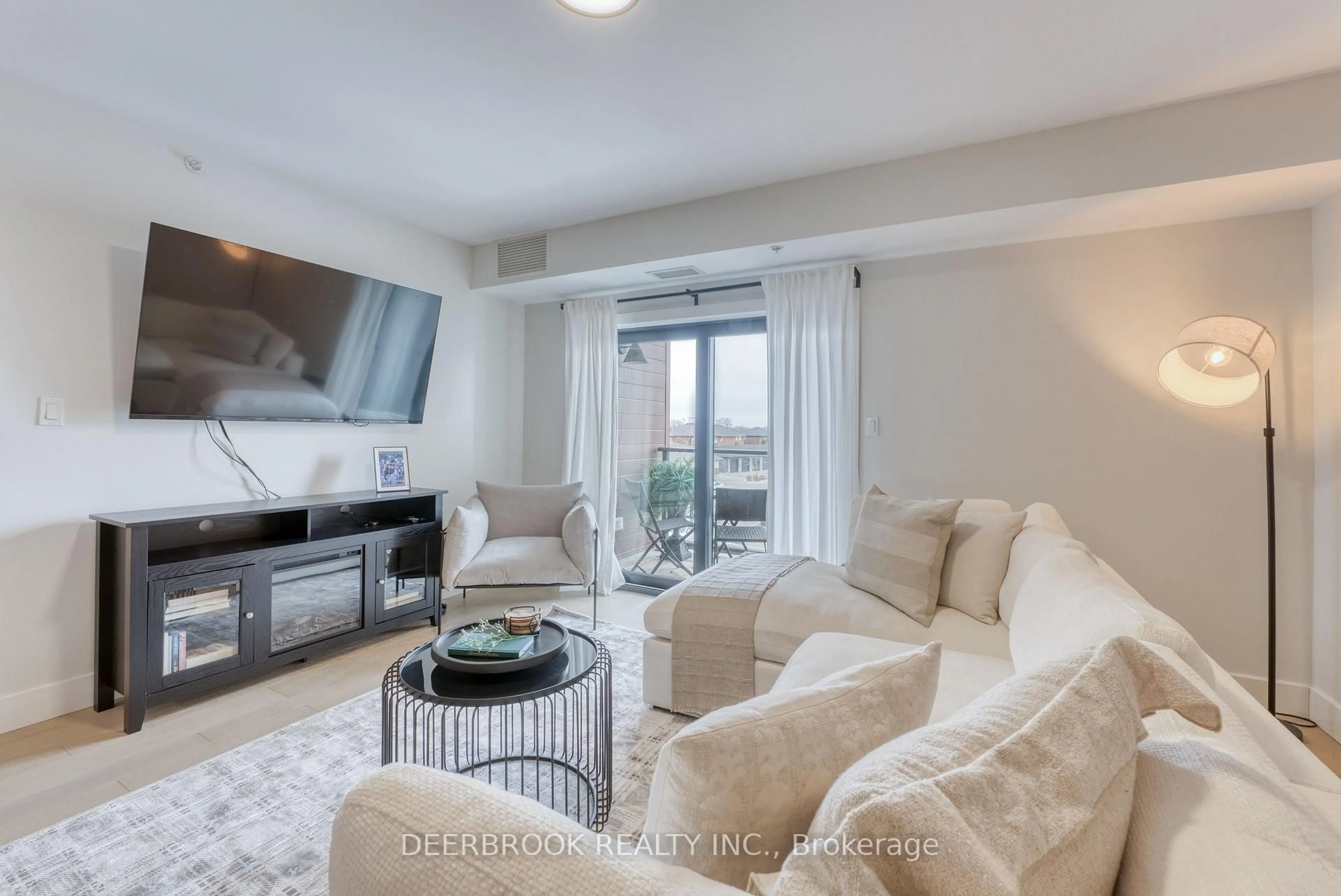 Living room with furniture, unknown for 4578 Huron Church Line Rd #313, LaSalle Ontario N9H 0M2