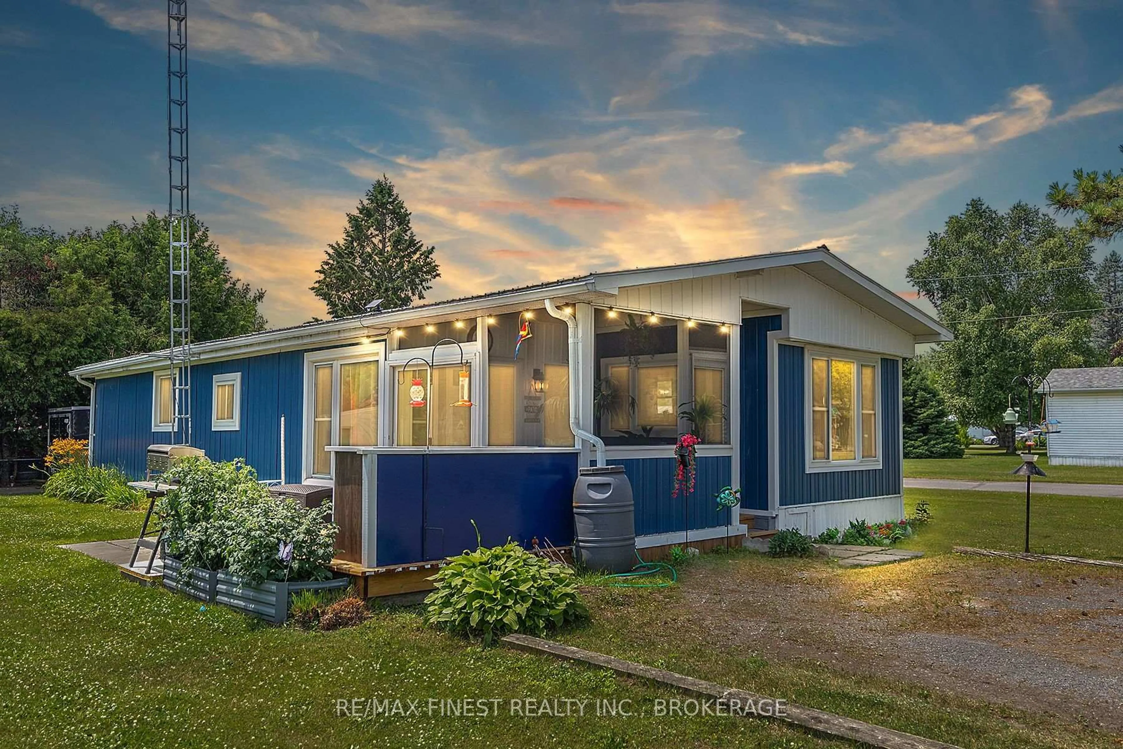 Home with vinyl exterior material, street for 4327 Elm St, South Frontenac Ontario K0K 2W0