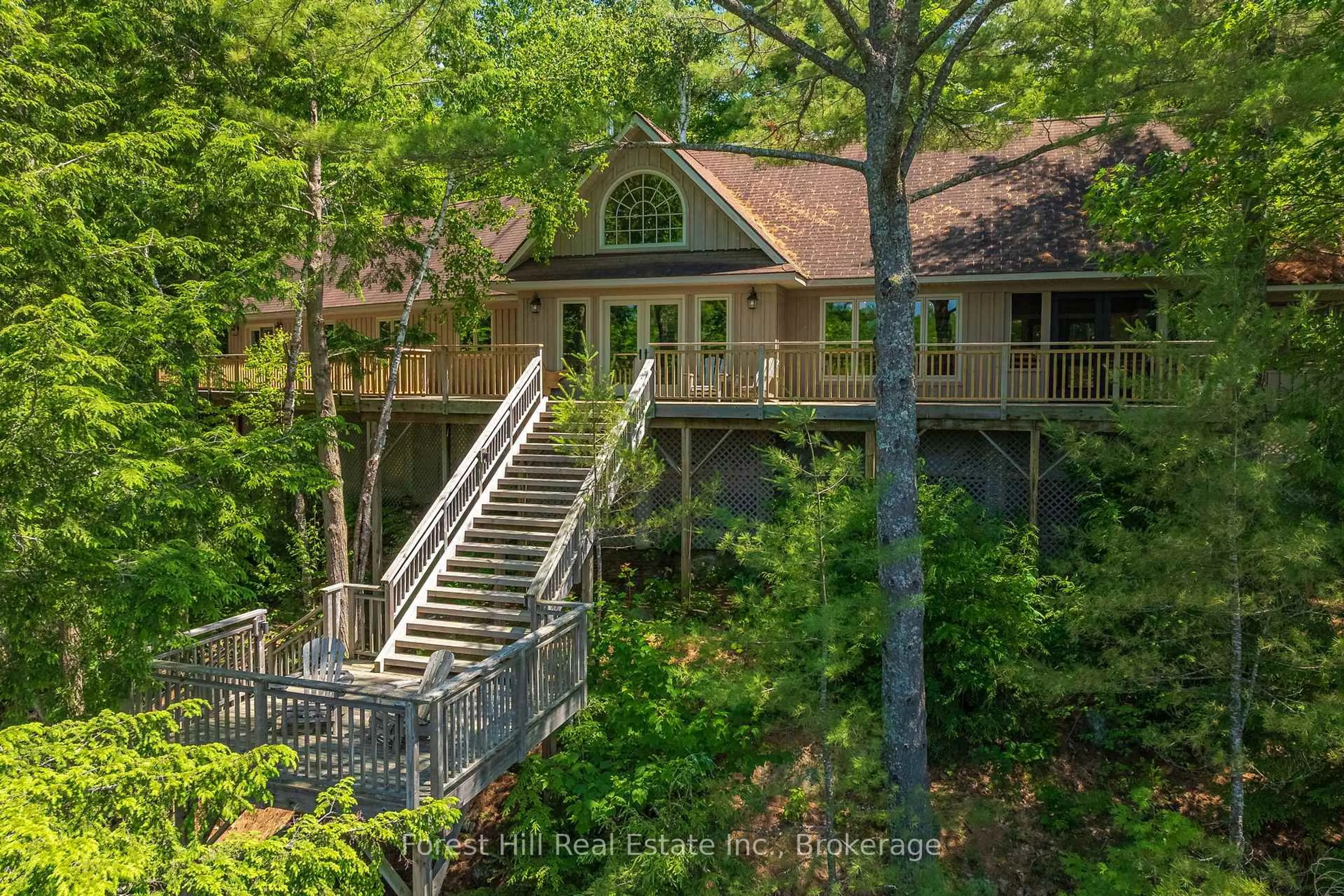 A pic from outside/outdoor area/front of a property/back of a property/a pic from drone, forest/trees view for 1 ISLAND SL 19 Island, Muskoka Lakes Ontario P0B 1M0