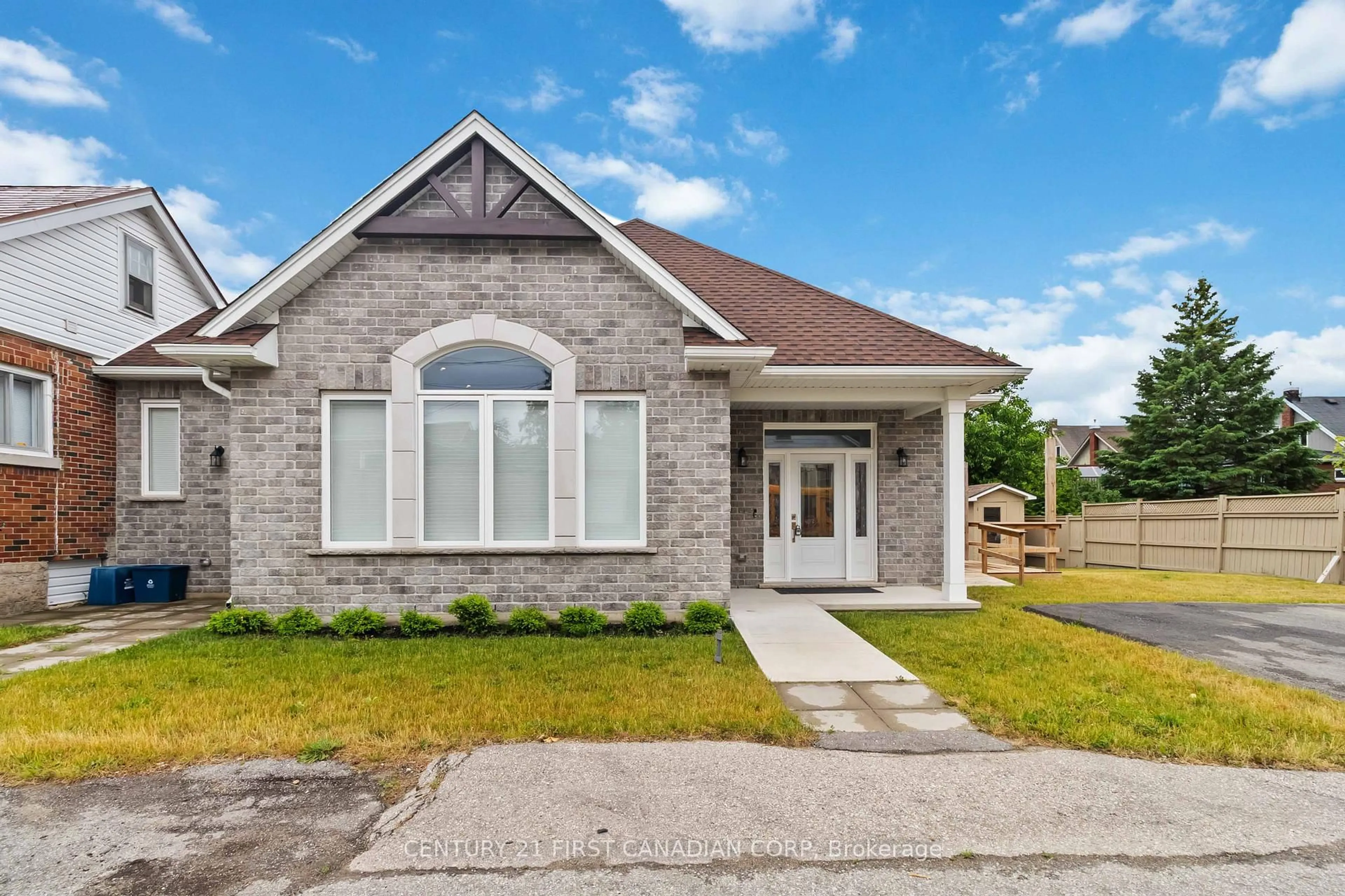 Home with brick exterior material, street for 310 St Paul Ave, Brantford Ontario N3R 4M8