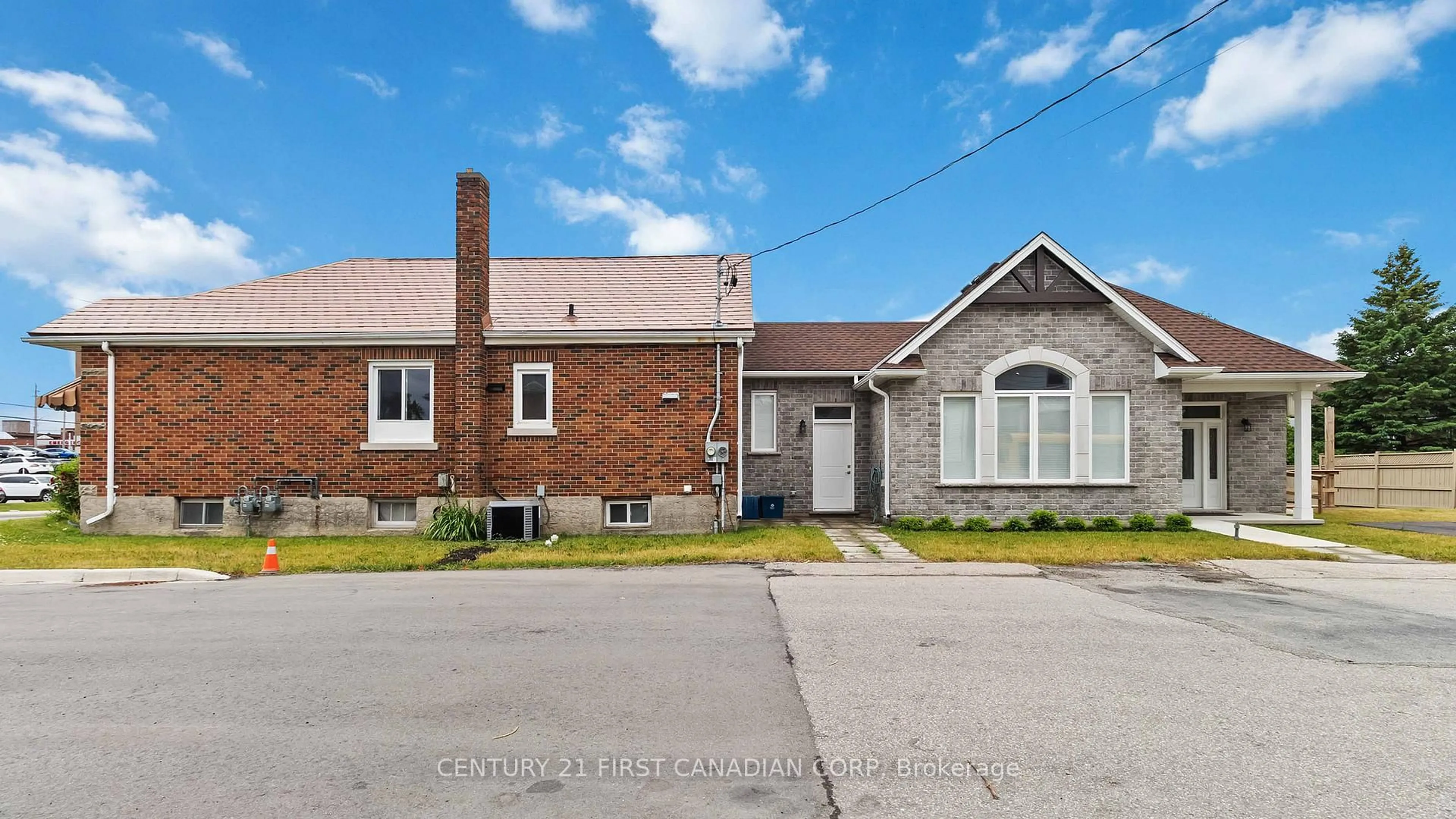 Home with brick exterior material, street for 310 St Paul Ave, Brantford Ontario N3R 4M8
