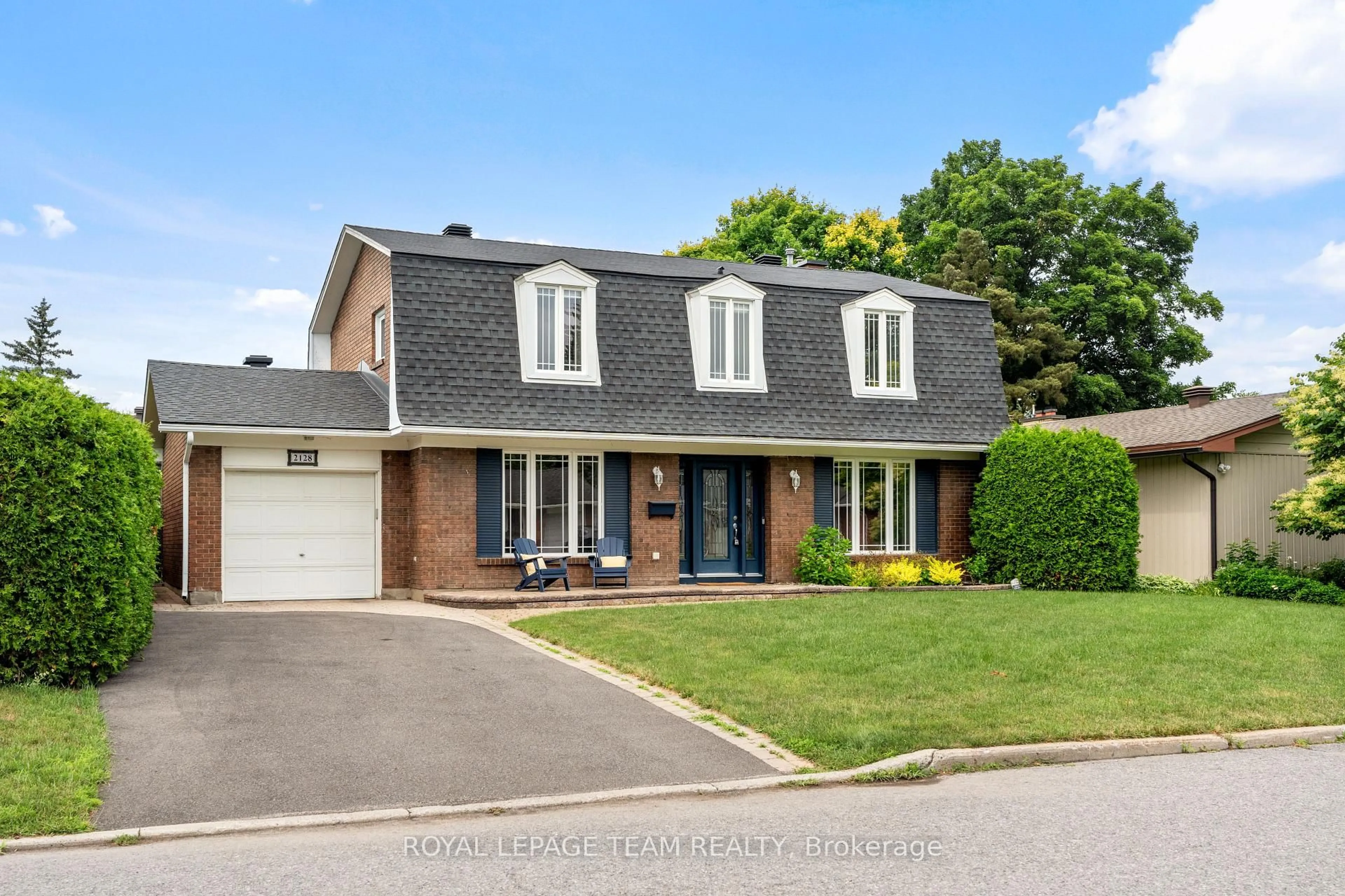 Home with brick exterior material, street for 2128 Hubbard Cres, Ottawa Ontario K1J 6L2
