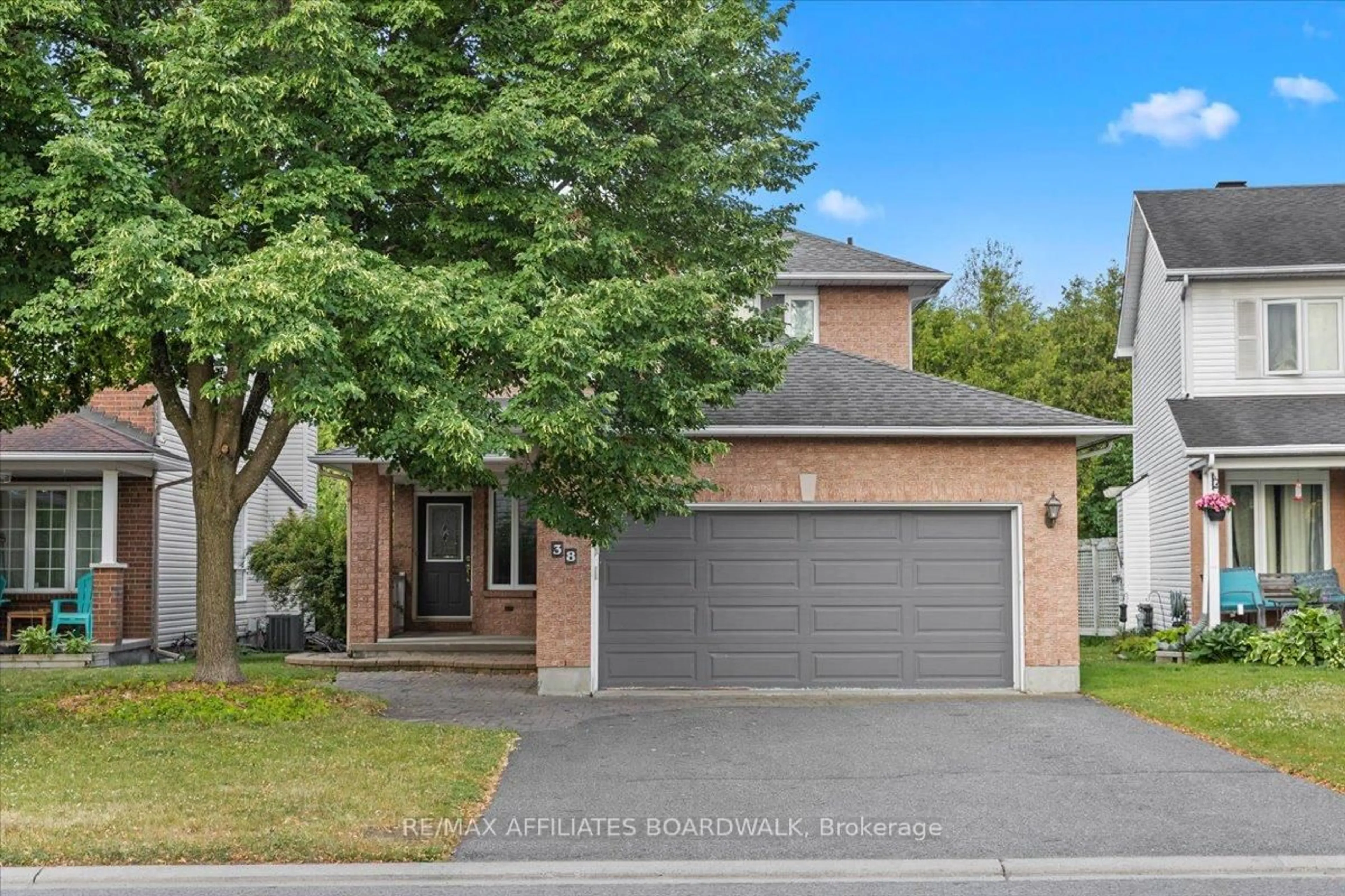 Home with brick exterior material, street for 38 Stonepath Cres, Stittsville Ontario K2S 1S4