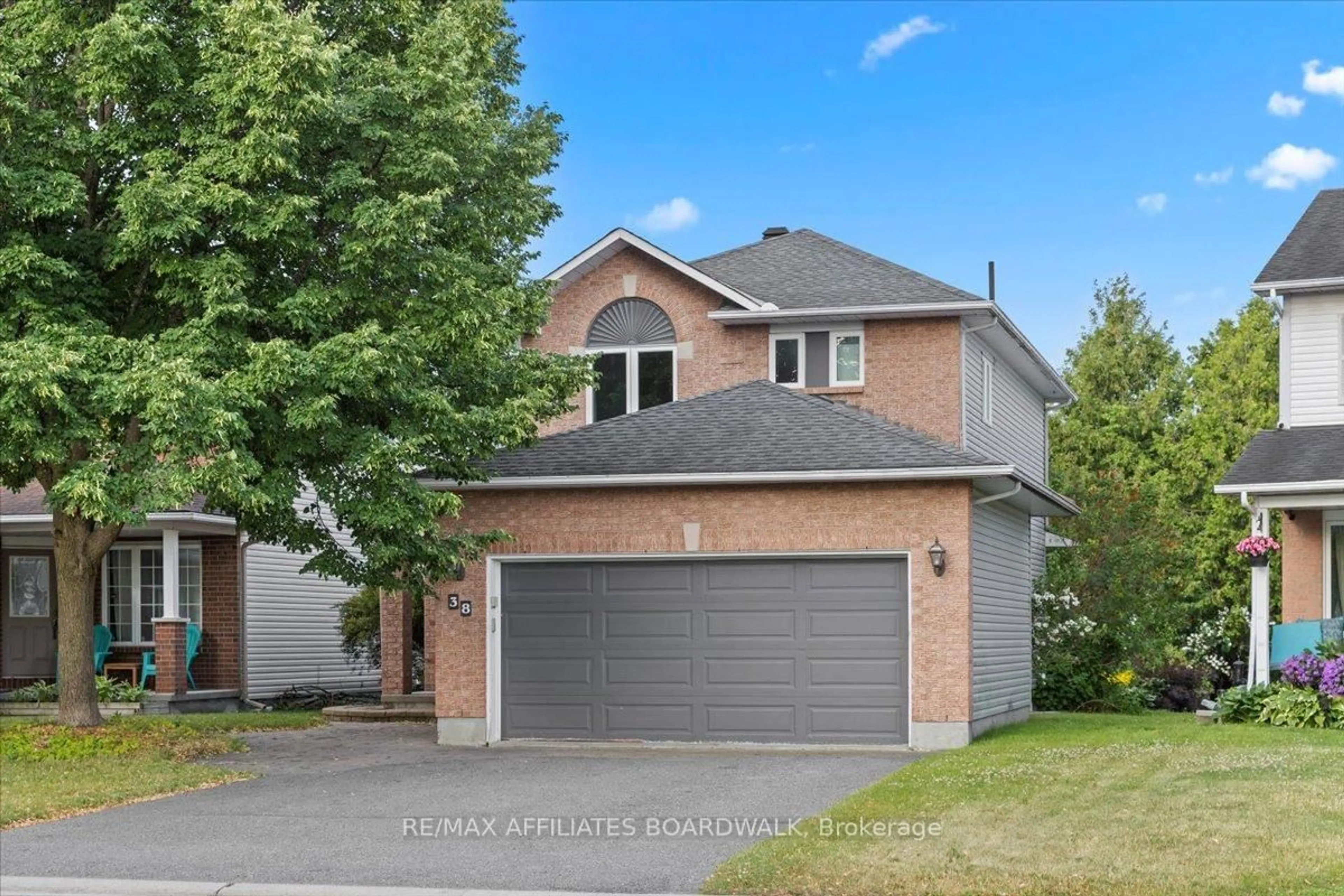 Home with brick exterior material, street for 38 Stonepath Cres, Stittsville Ontario K2S 1S4
