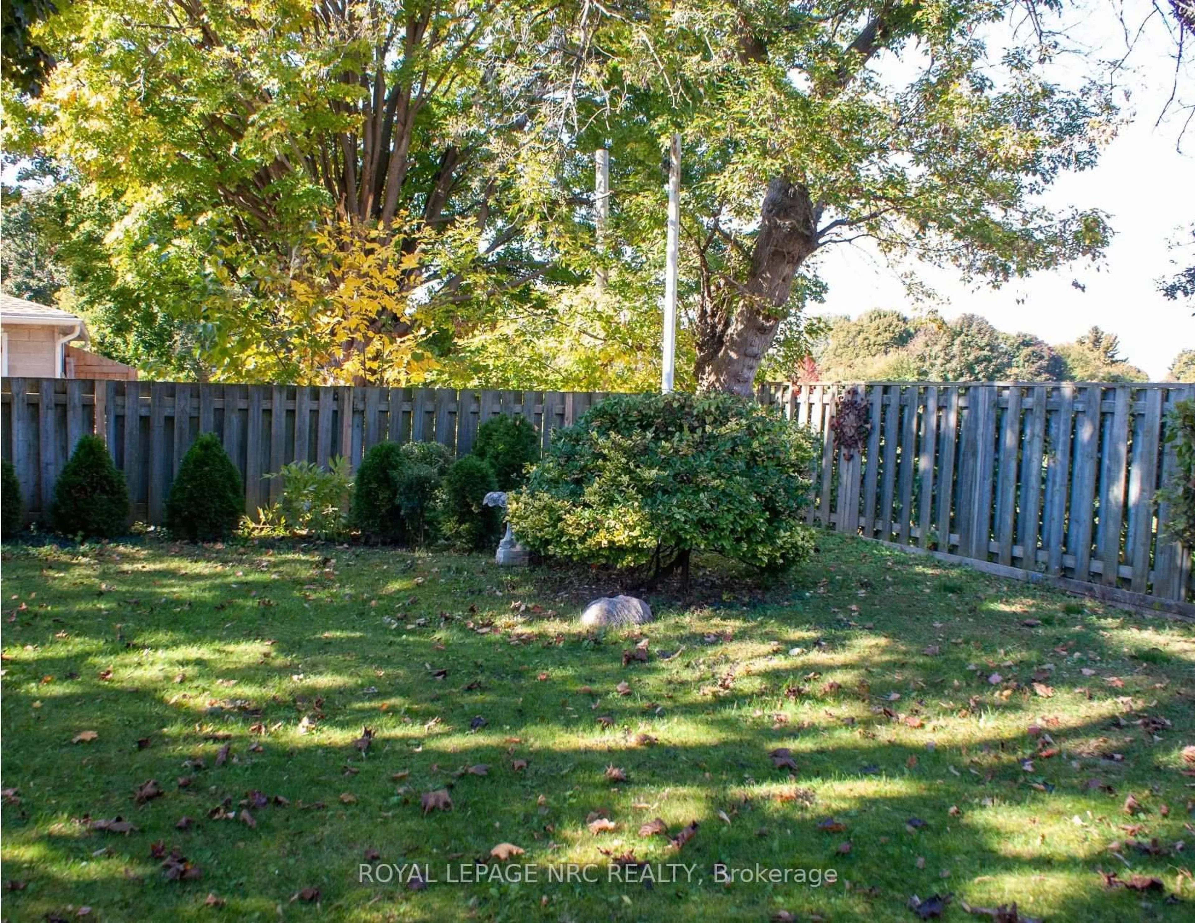 A pic from outside/outdoor area/front of a property/back of a property/a pic from drone, forest/trees view for 553 Carlton St, St. Catharines Ontario L2M 4X6