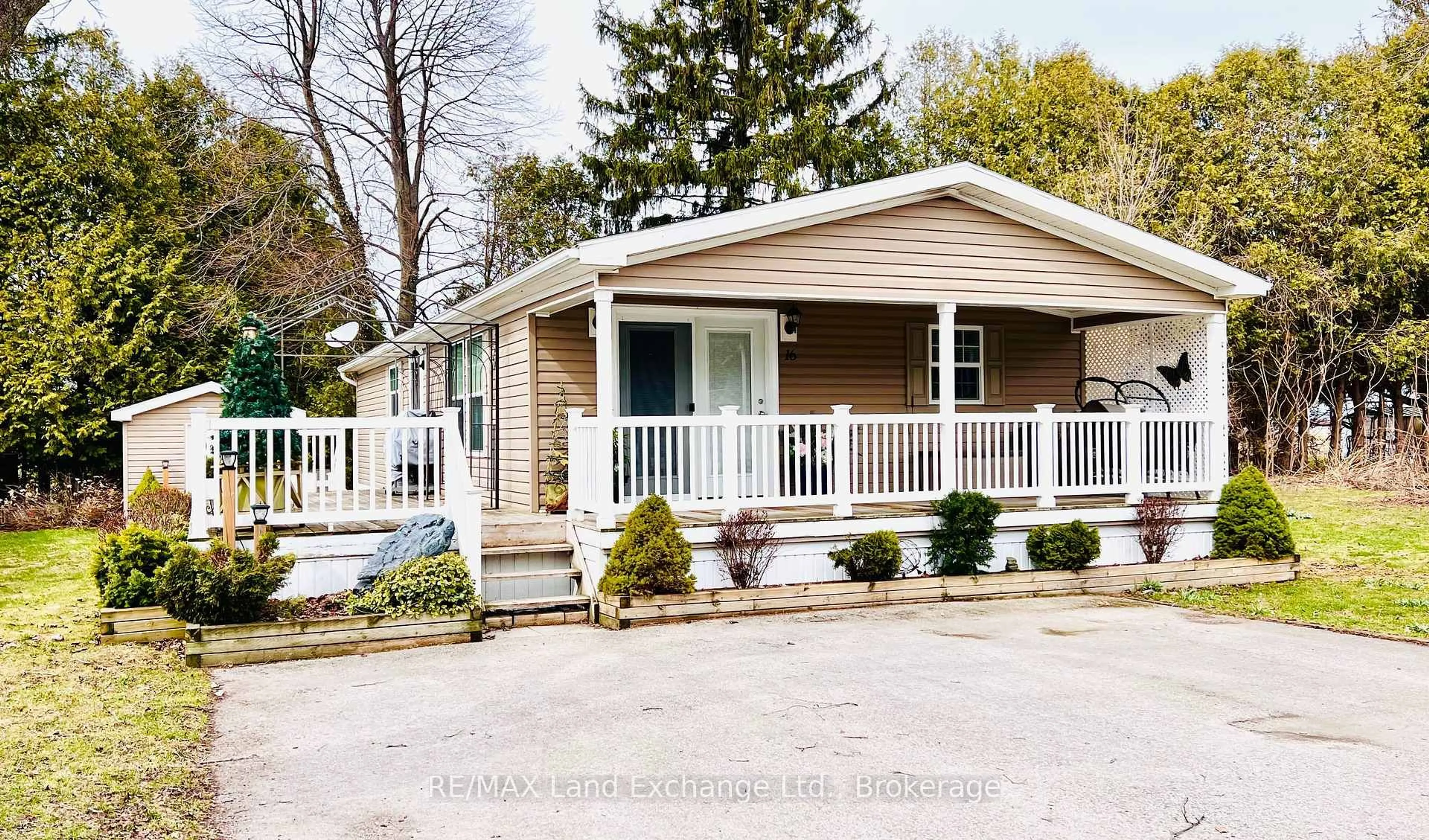 Home with vinyl exterior material, street for 16 Sutton Dr, Ashfield-Colborne-Wawanosh Ontario N7A 3Y3
