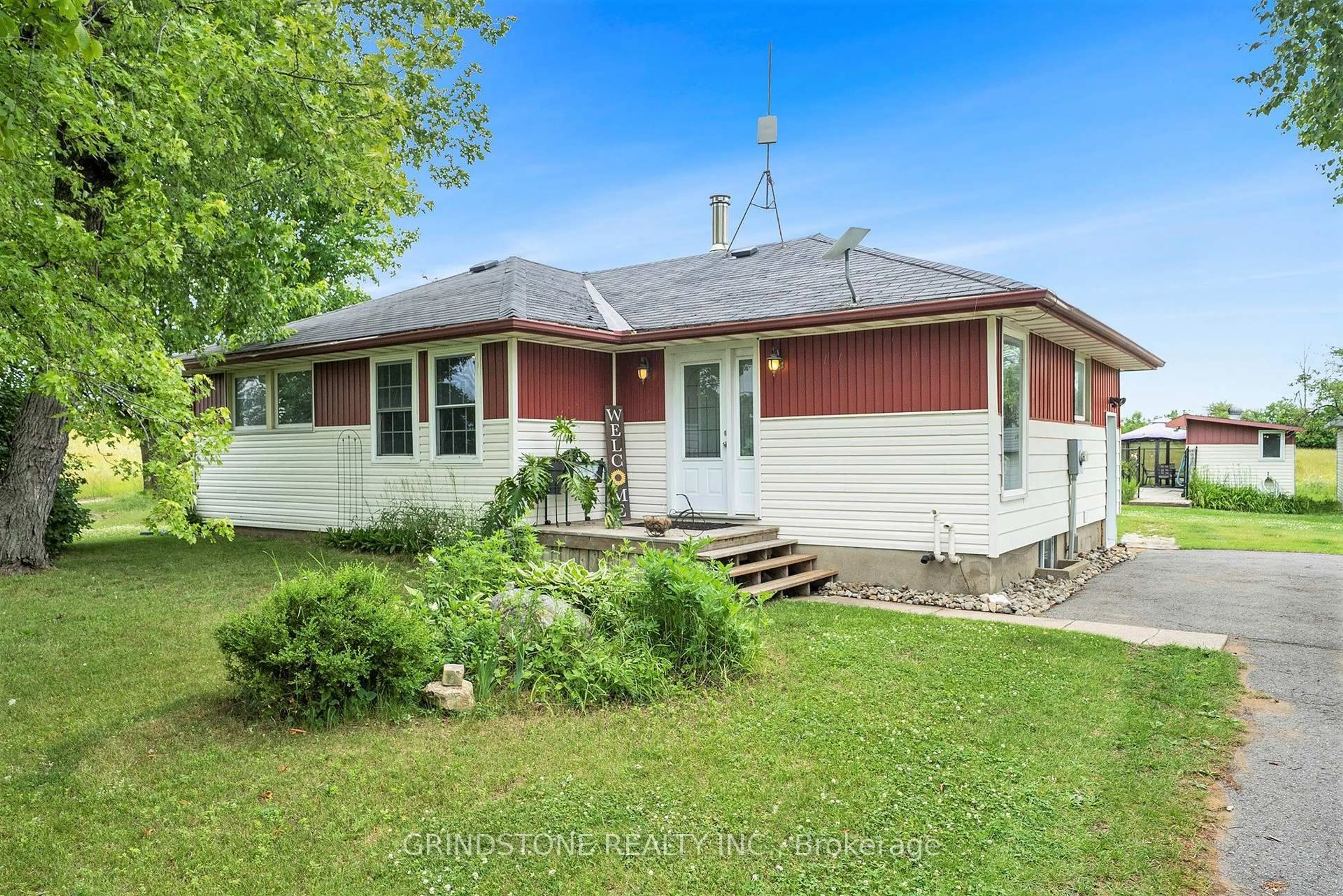 A pic from outside/outdoor area/front of a property/back of a property/a pic from drone, street for 11754 Highway 15 Highway, Montague Ontario K7A 0G9
