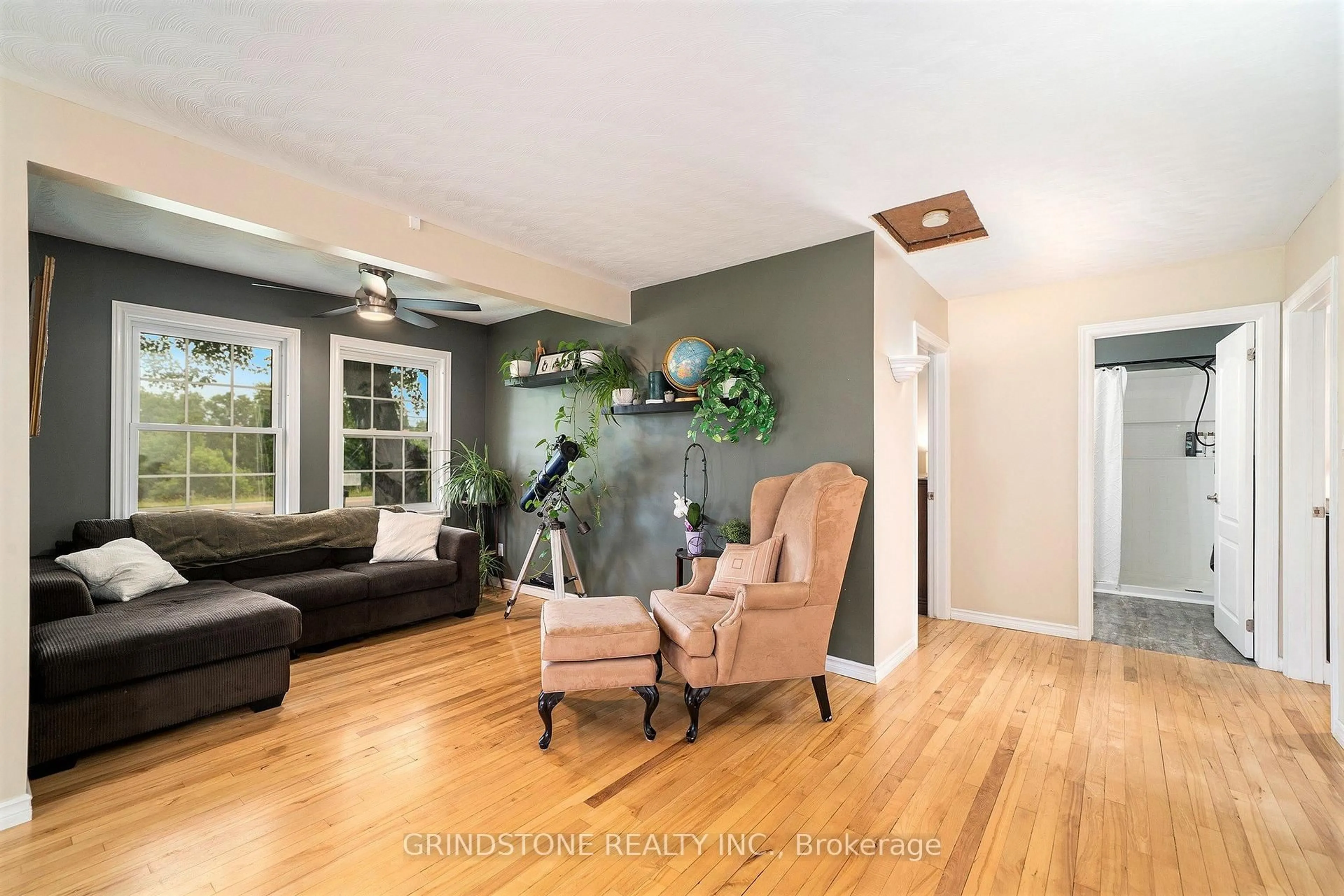 Living room with furniture, wood/laminate floor for 11754 Highway 15 Highway, Montague Ontario K7A 0G9