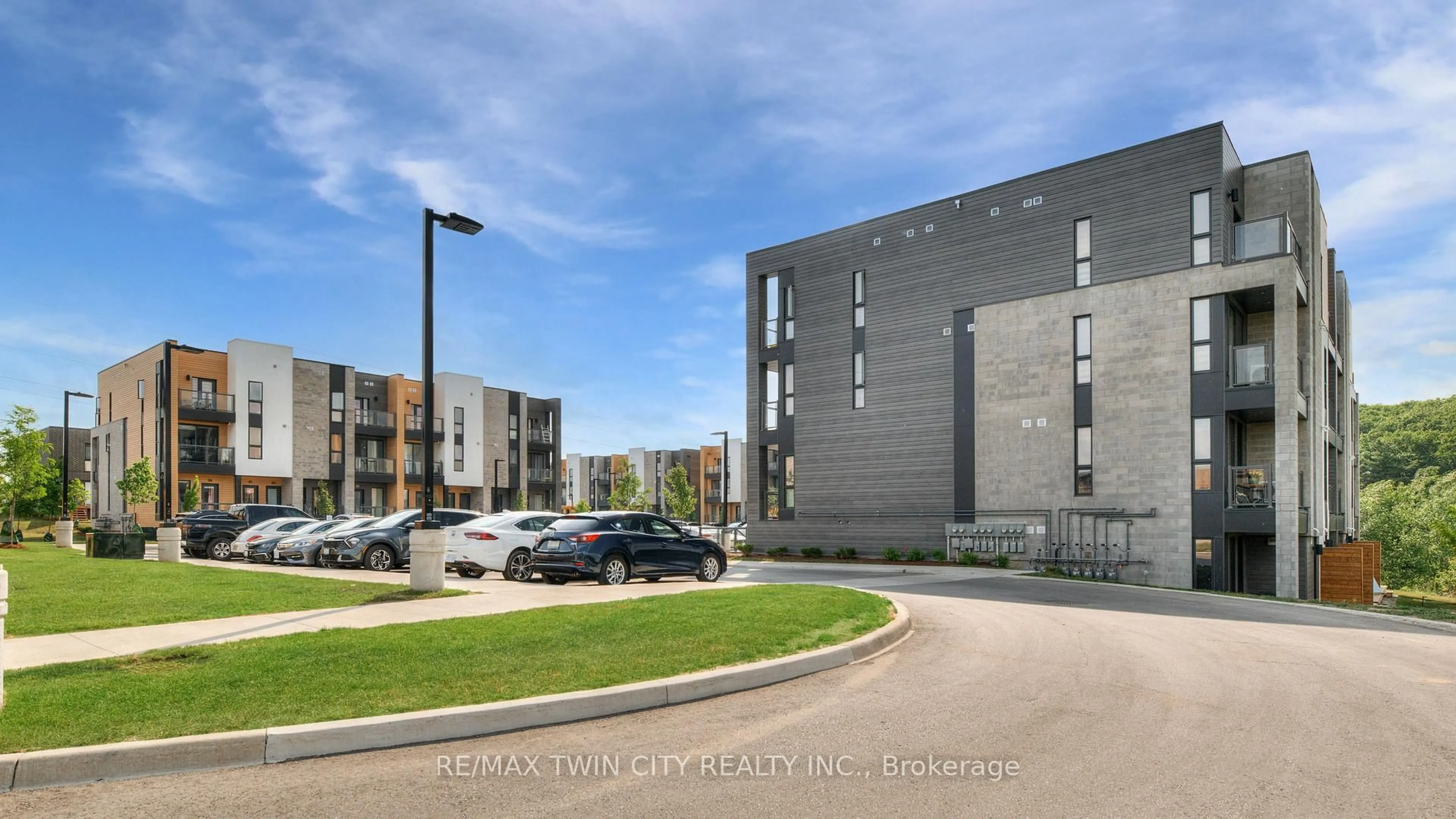 A pic from outside/outdoor area/front of a property/back of a property/a pic from drone, street for 261 Woodbine Ave #86, Kitchener Ontario N2R 0S7