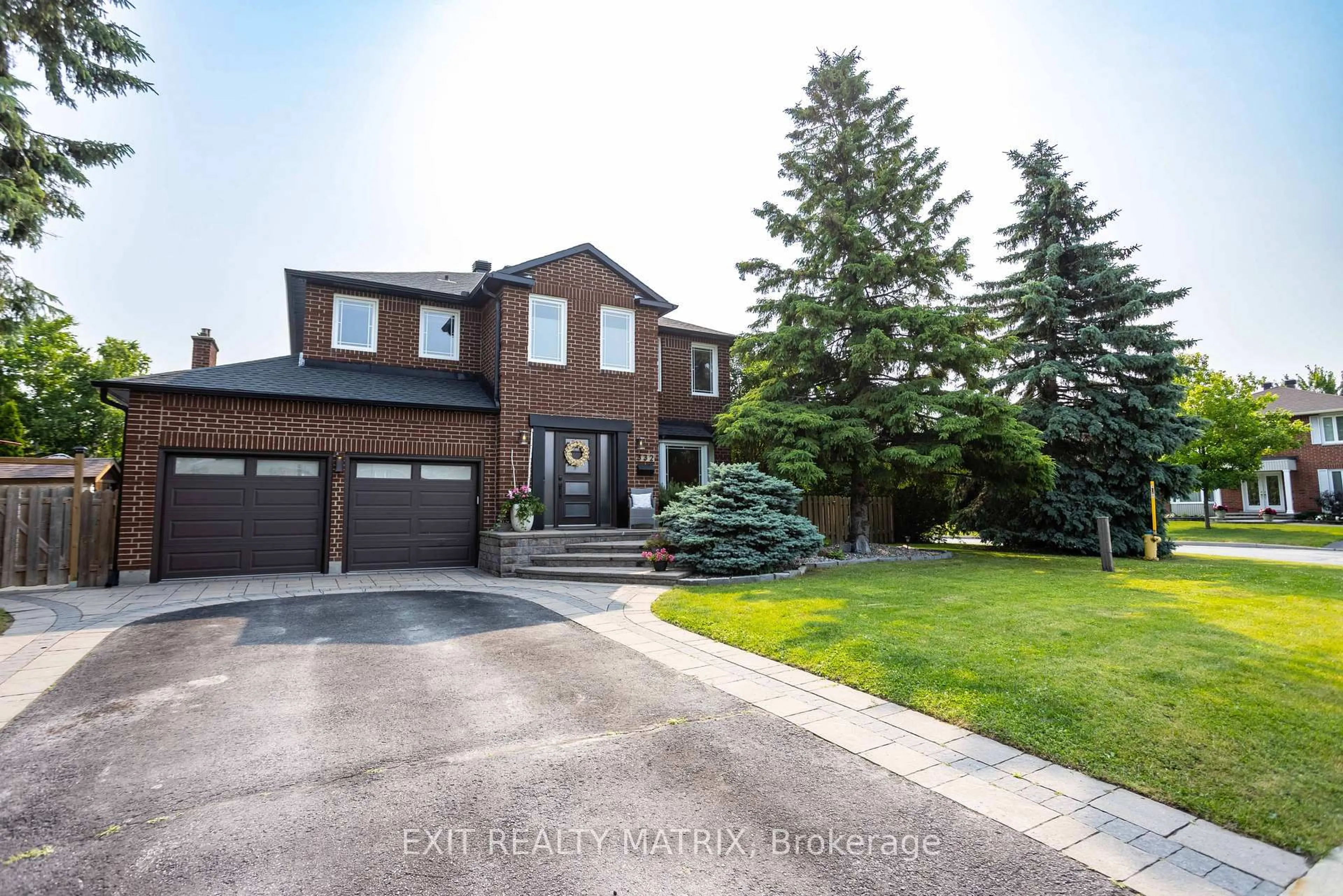 Home with brick exterior material, street for 332 River Ridge Cres, Ottawa Ontario K1E 3N1