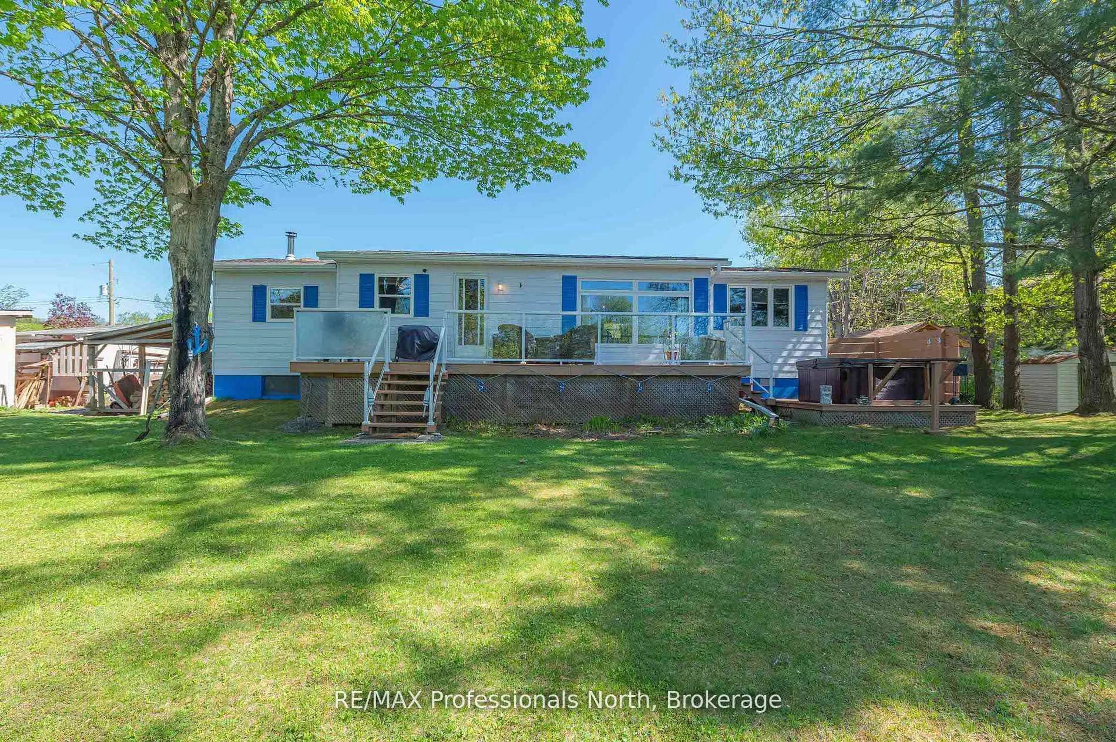 A pic from outside/outdoor area/front of a property/back of a property/a pic from drone, water/lake/river/ocean view for 1027 Current Tr, Minden Hills Ontario K0M 2K0