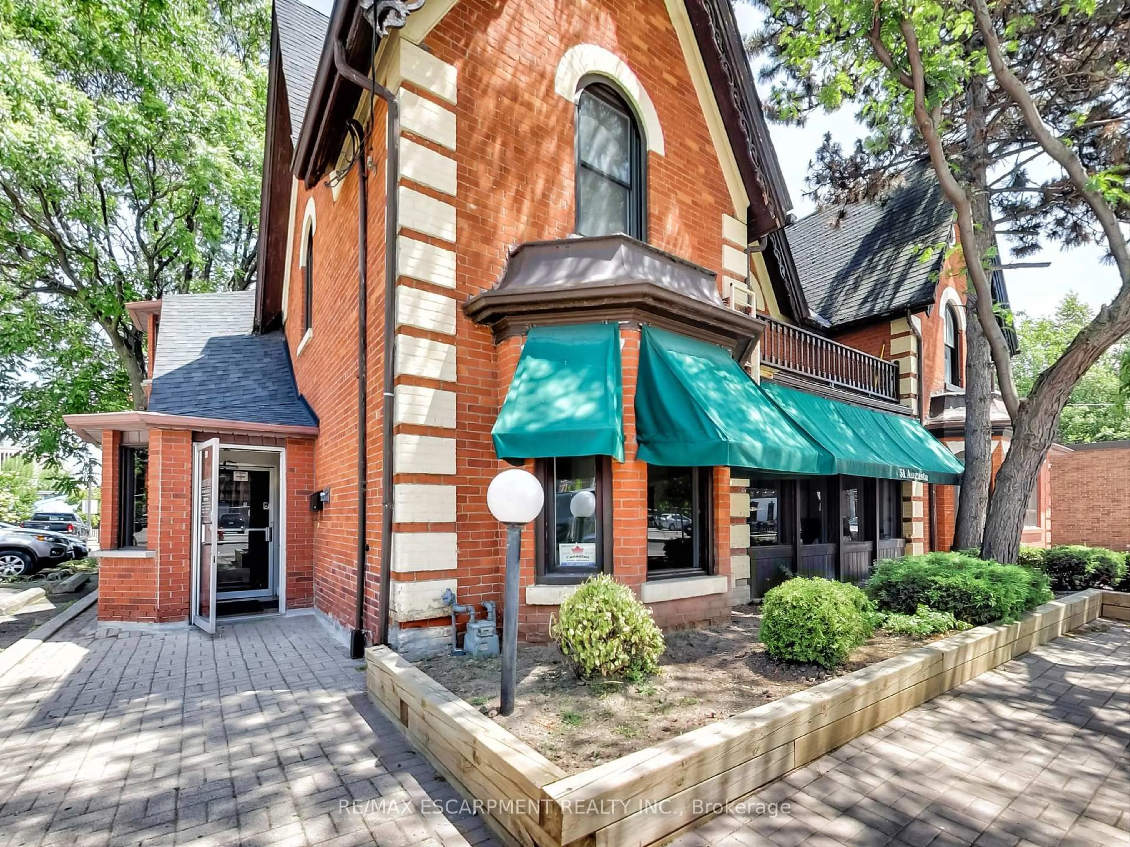 Home with brick exterior material, street for 51 Augusta St, Hamilton Ontario L8N 1P8