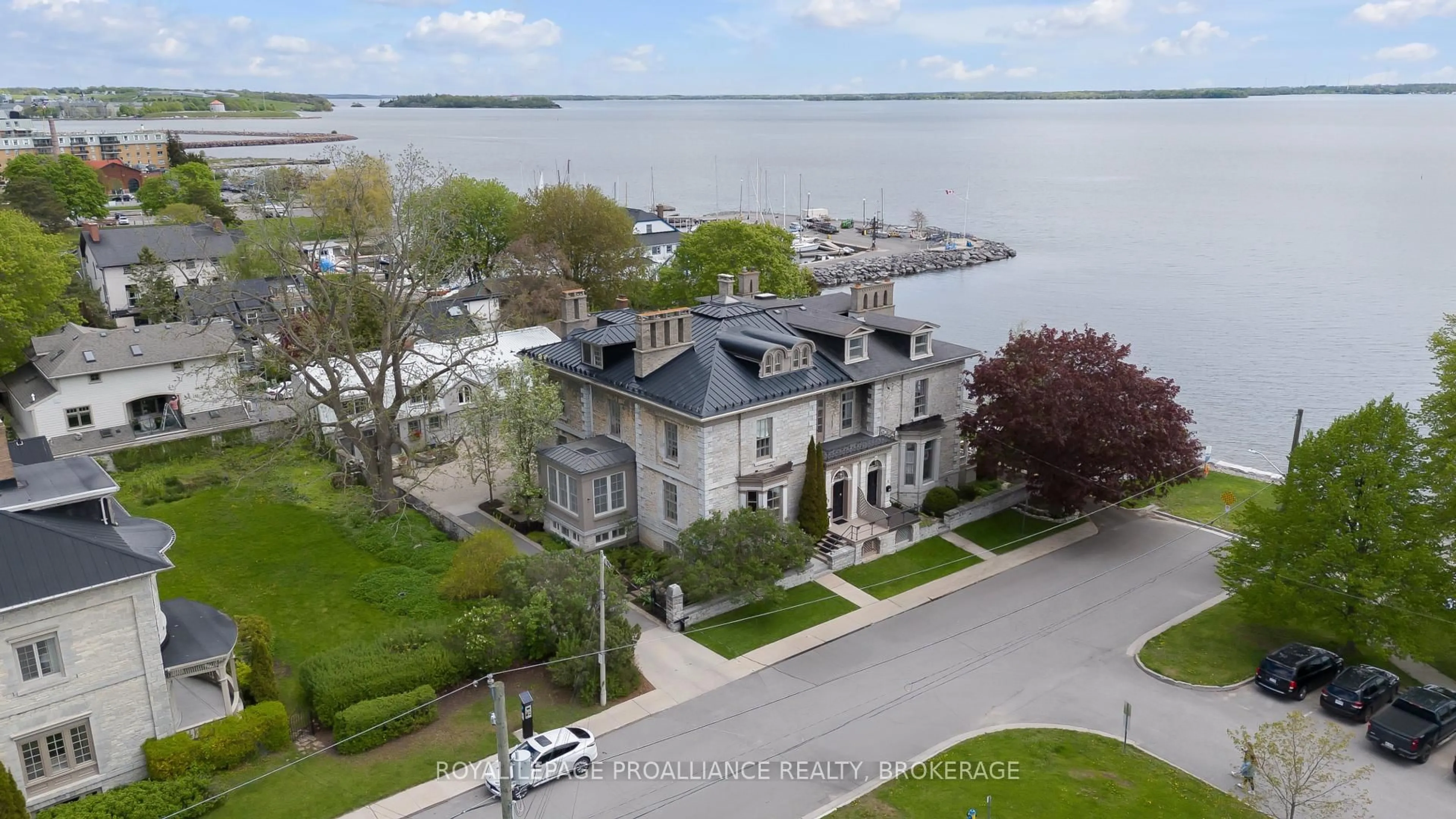 A pic from outside/outdoor area/front of a property/back of a property/a pic from drone, water/lake/river/ocean view for 3 Emily St, Kingston Ontario K7L 2W2