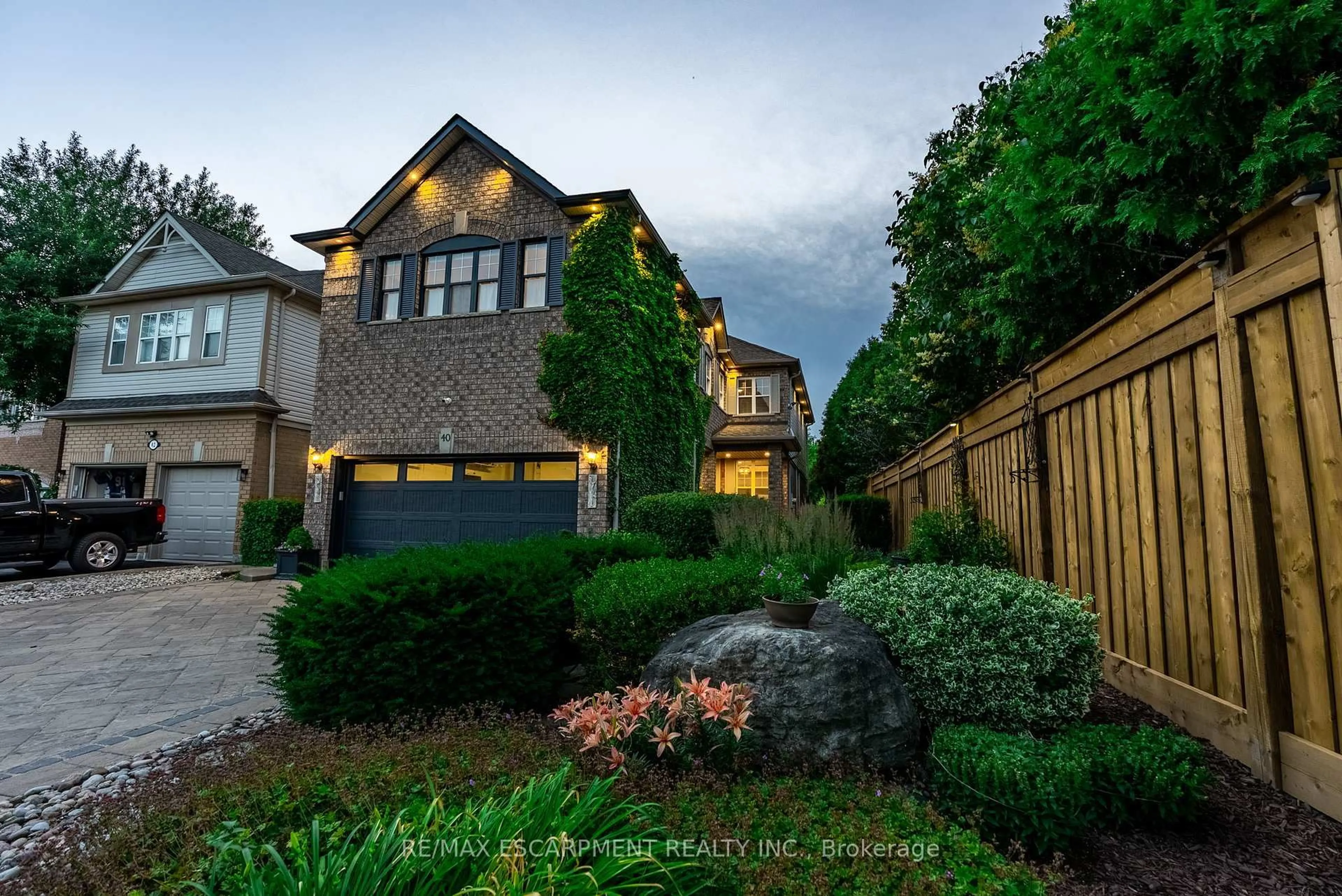 Home with brick exterior material, street for 40 Premier Rd, Hamilton Ontario L8B 0K7