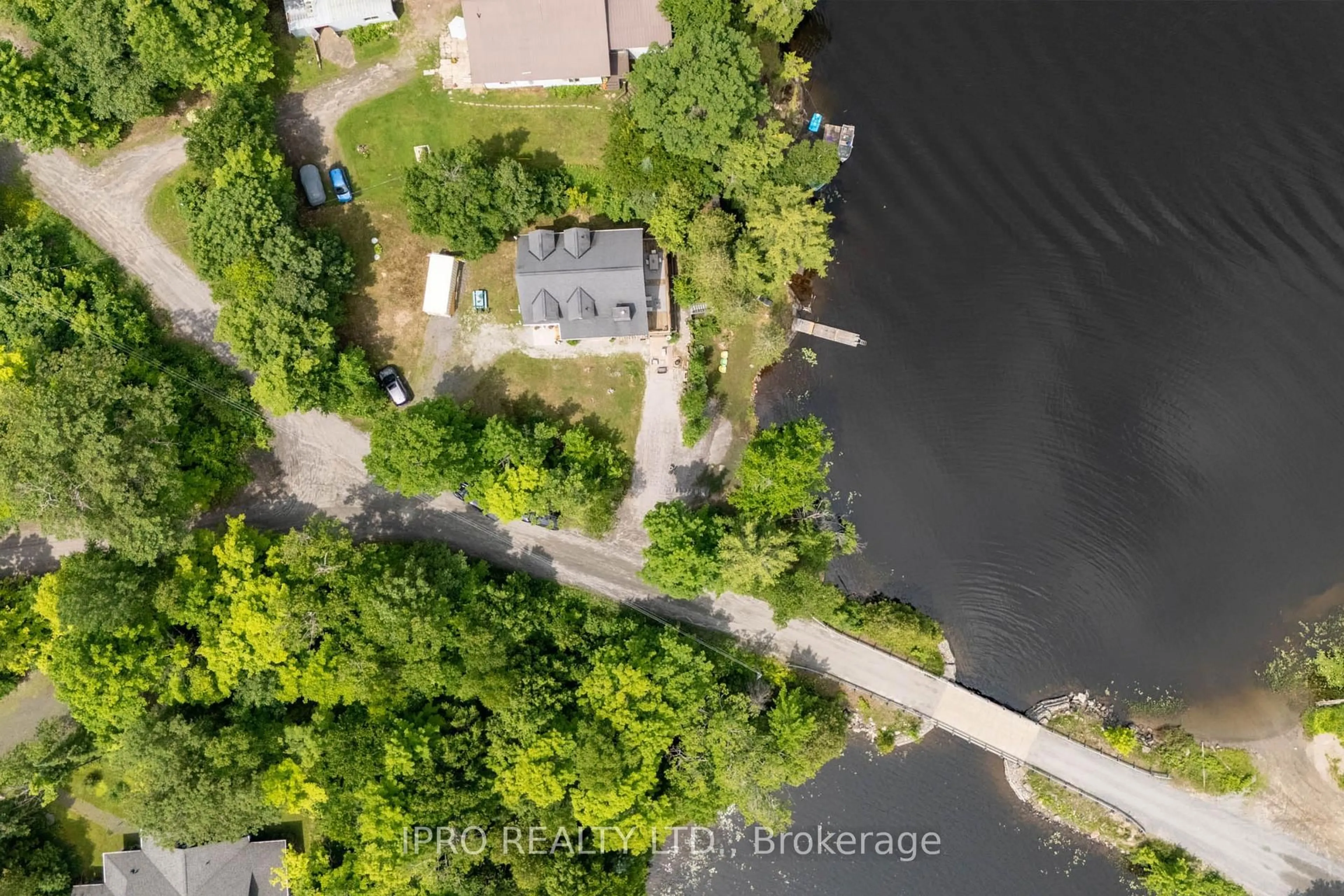 A pic from outside/outdoor area/front of a property/back of a property/a pic from drone, water/lake/river/ocean view for 1 Mckowen Rd, McKellar Ontario P0G 1C0