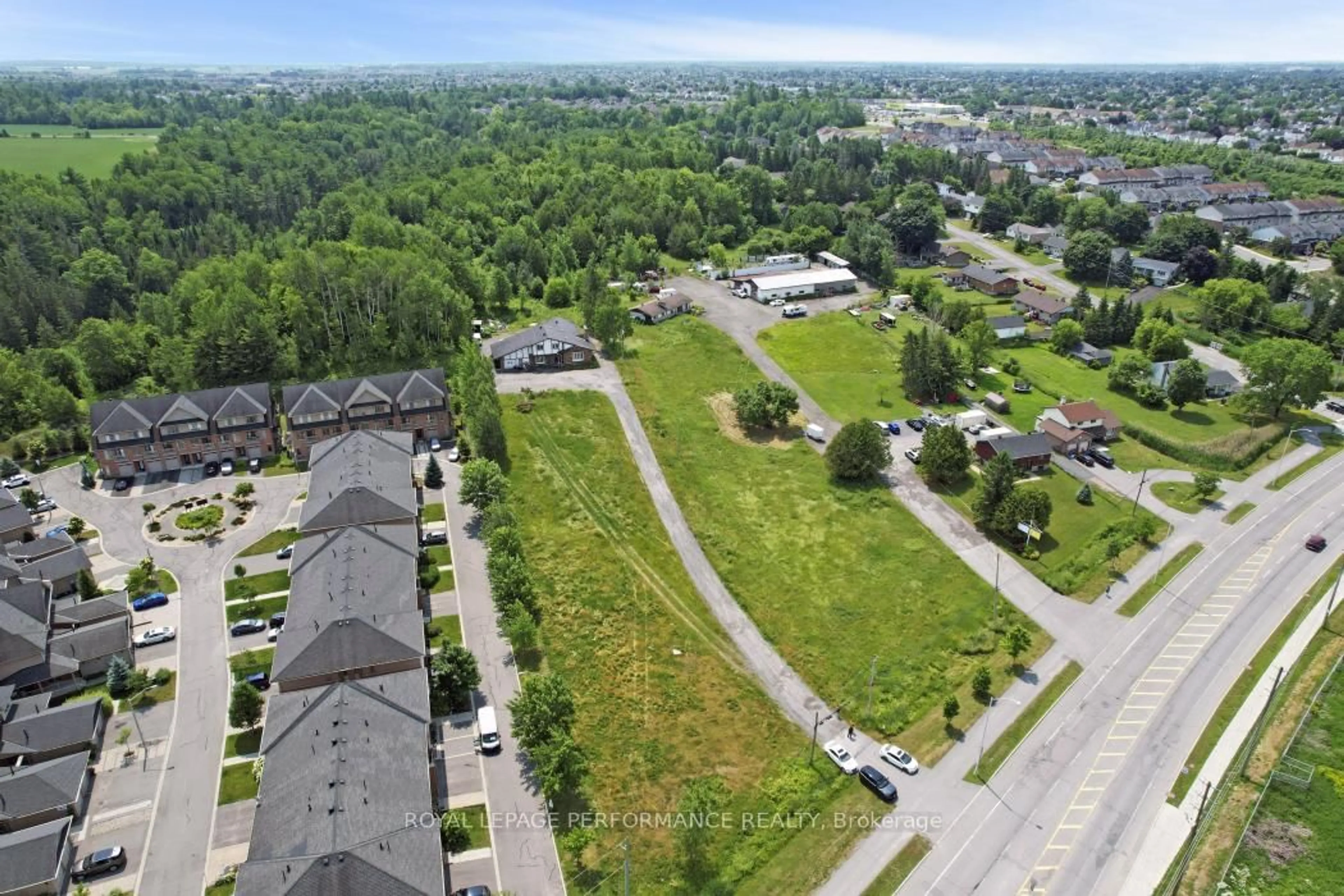 A pic from outside/outdoor area/front of a property/back of a property/a pic from drone, street for 1016 Old Montreal Rd, Ottawa Ontario K4A 3N2