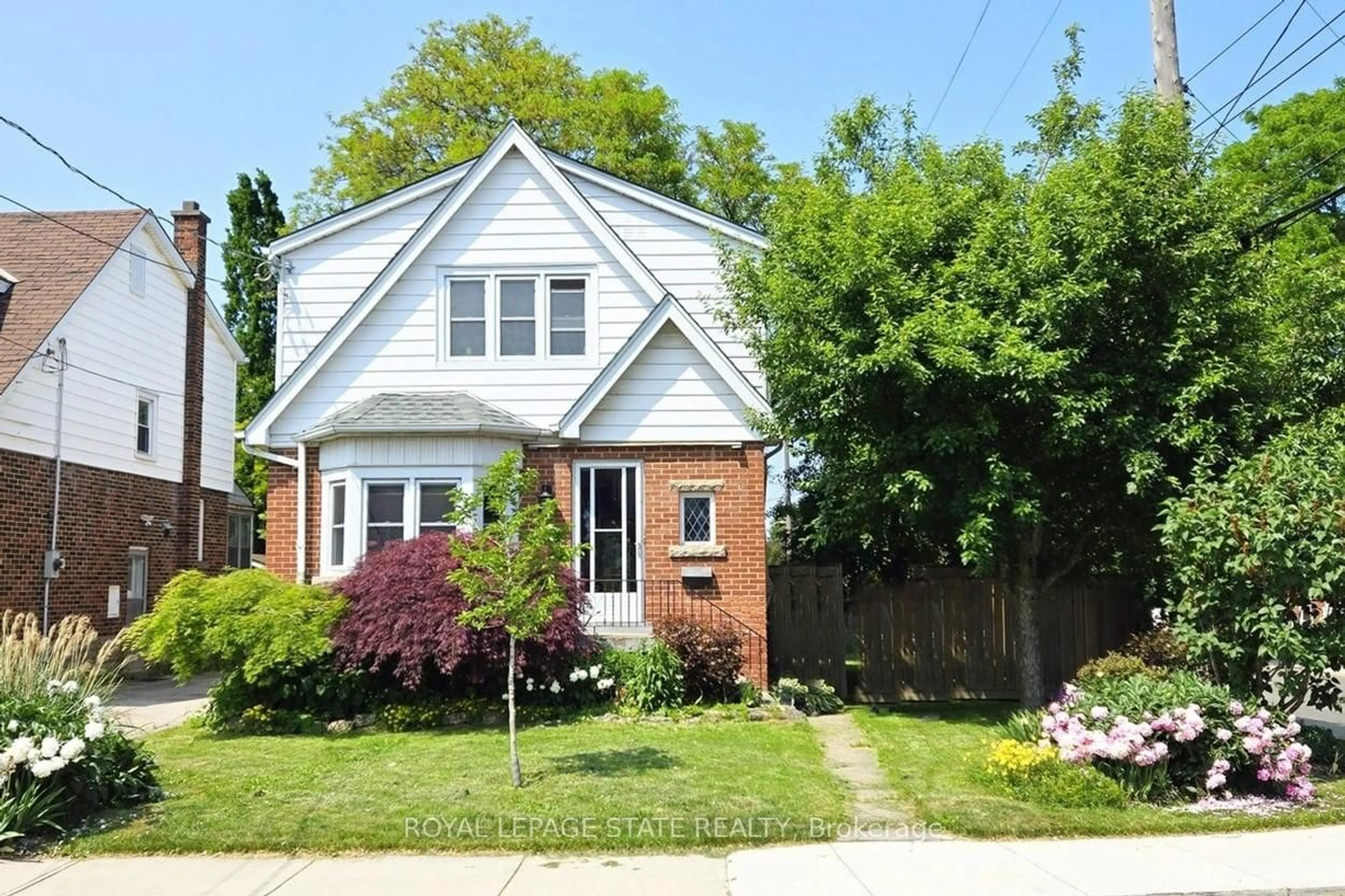 Home with brick exterior material, street for 104 Glen Rd, Hamilton Ontario L8S 3M9