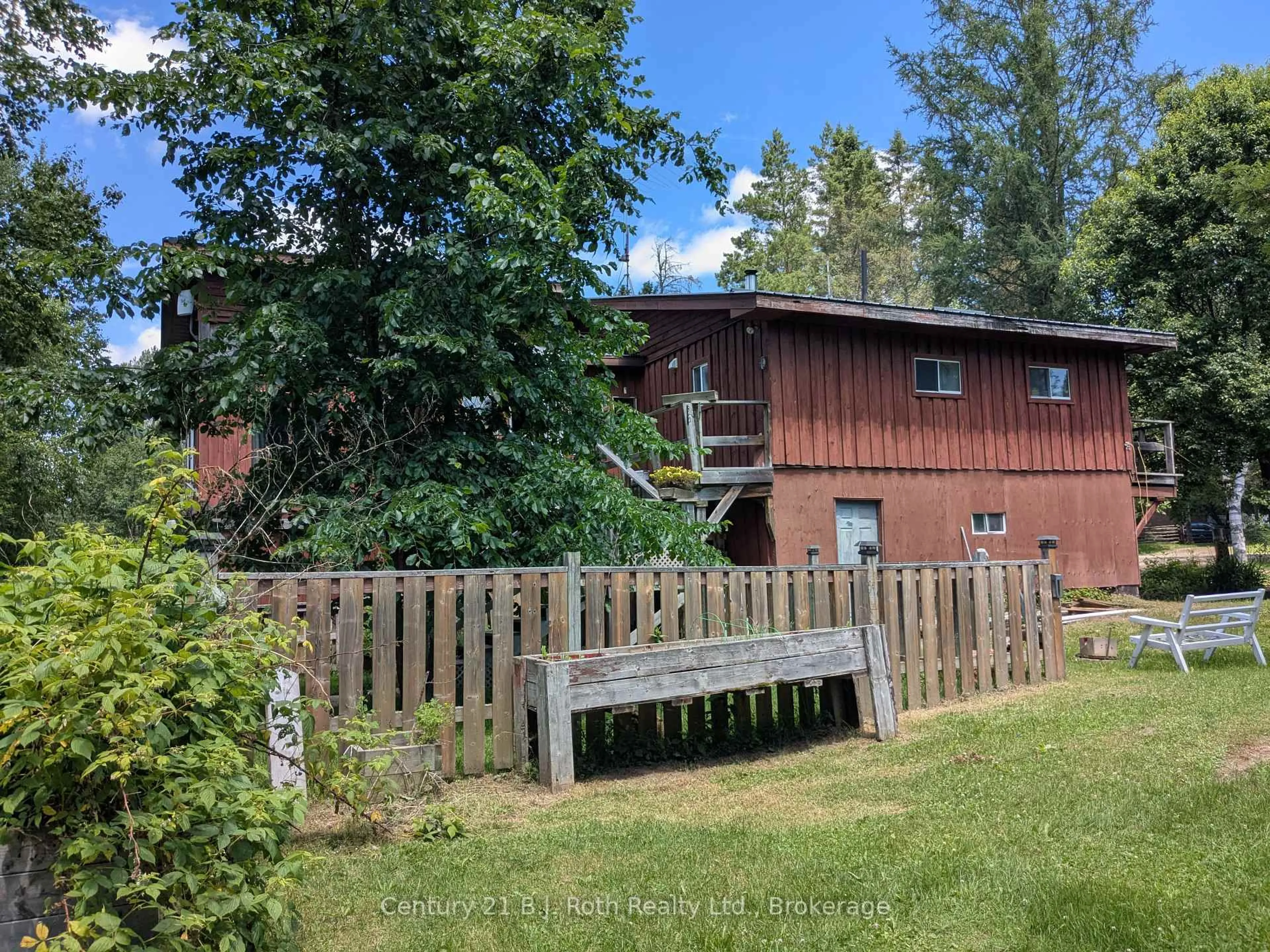 A pic from outside/outdoor area/front of a property/back of a property/a pic from drone, unknown for 288 River Rd, Magnetawan Ontario P0A 1P0
