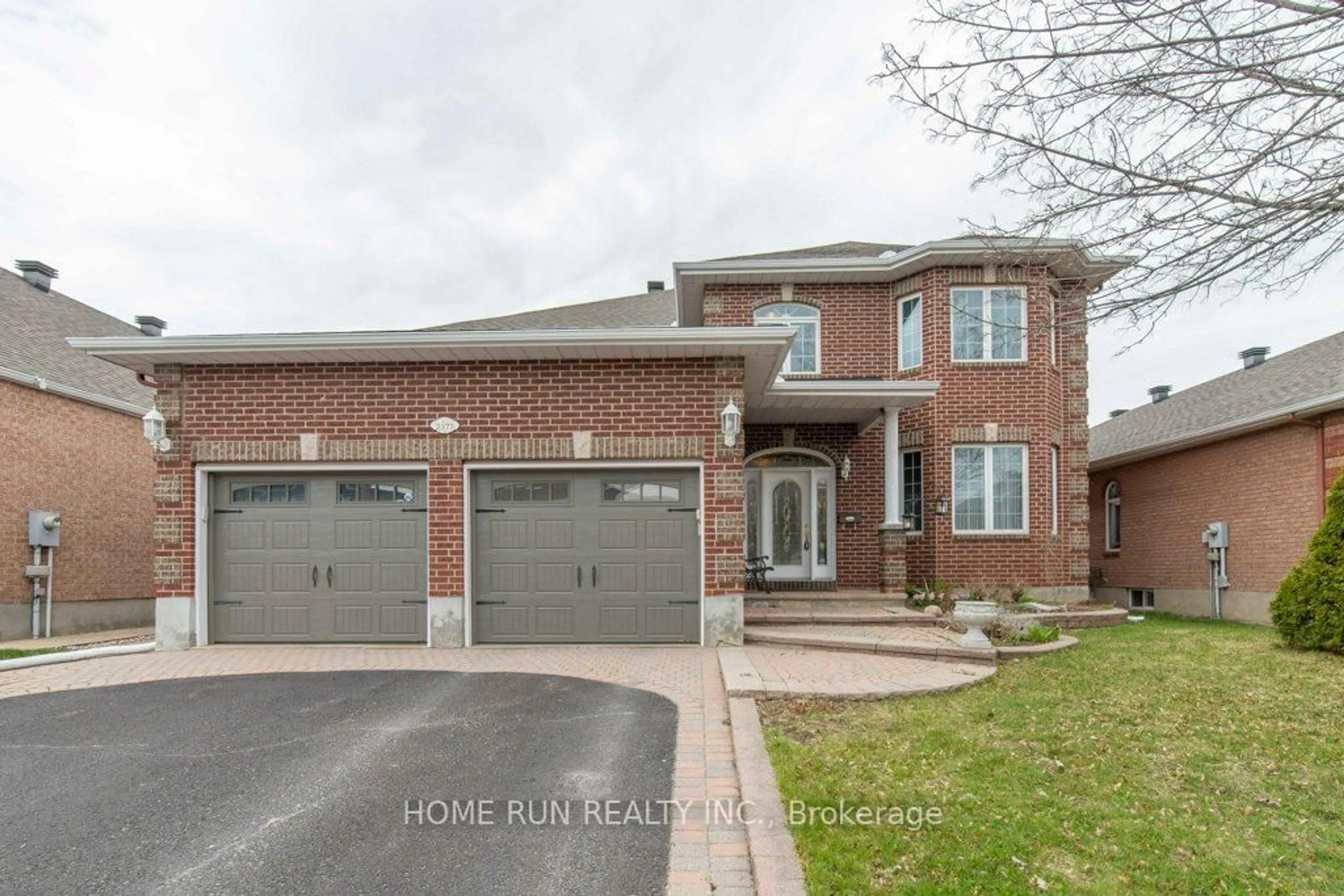 Home with brick exterior material, street for 2377 Kendron Lane, Ottawa Ontario K1V 0Y8