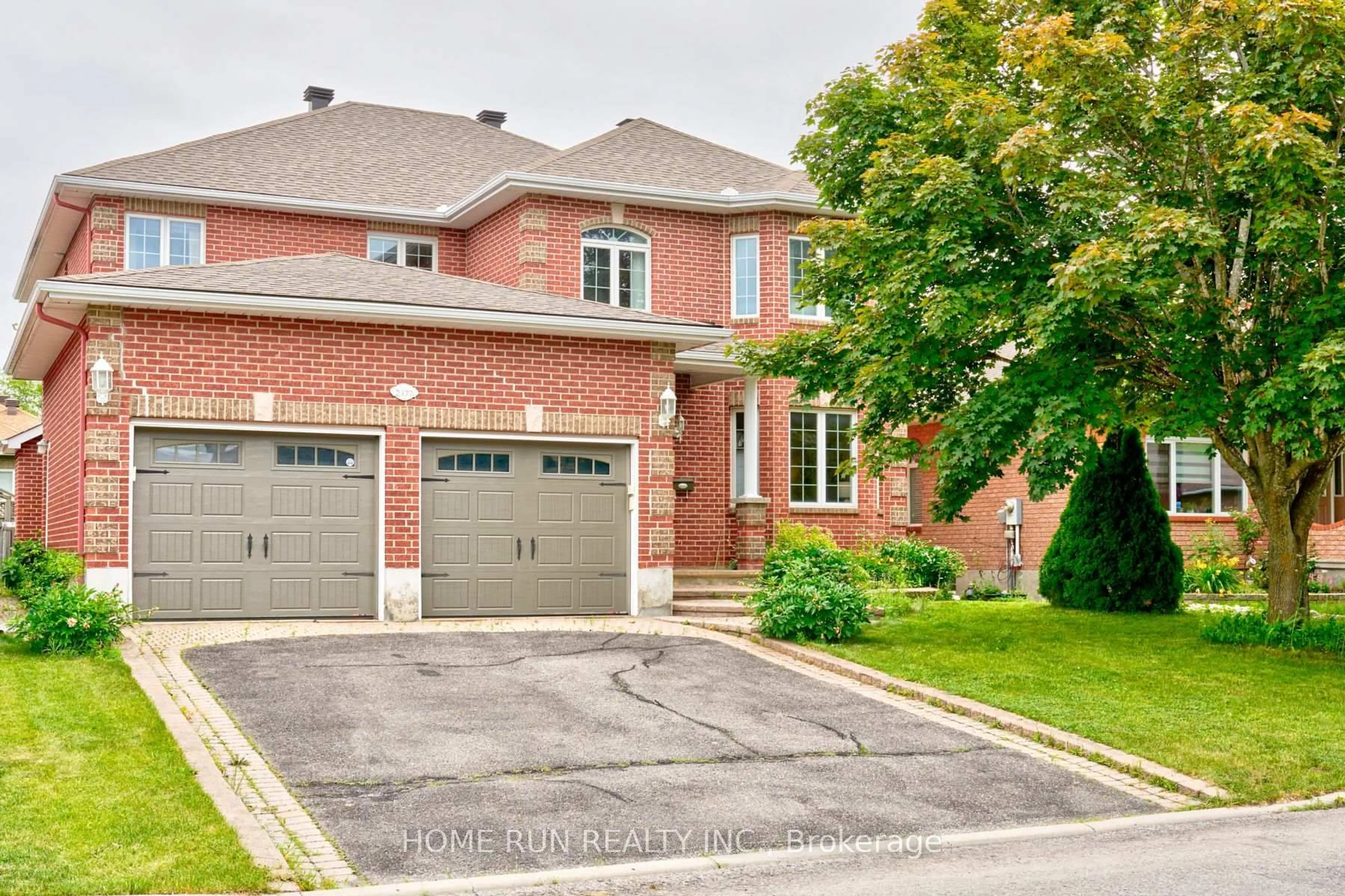Home with brick exterior material, street for 2377 Kendron Lane, Ottawa Ontario K1V 0Y8